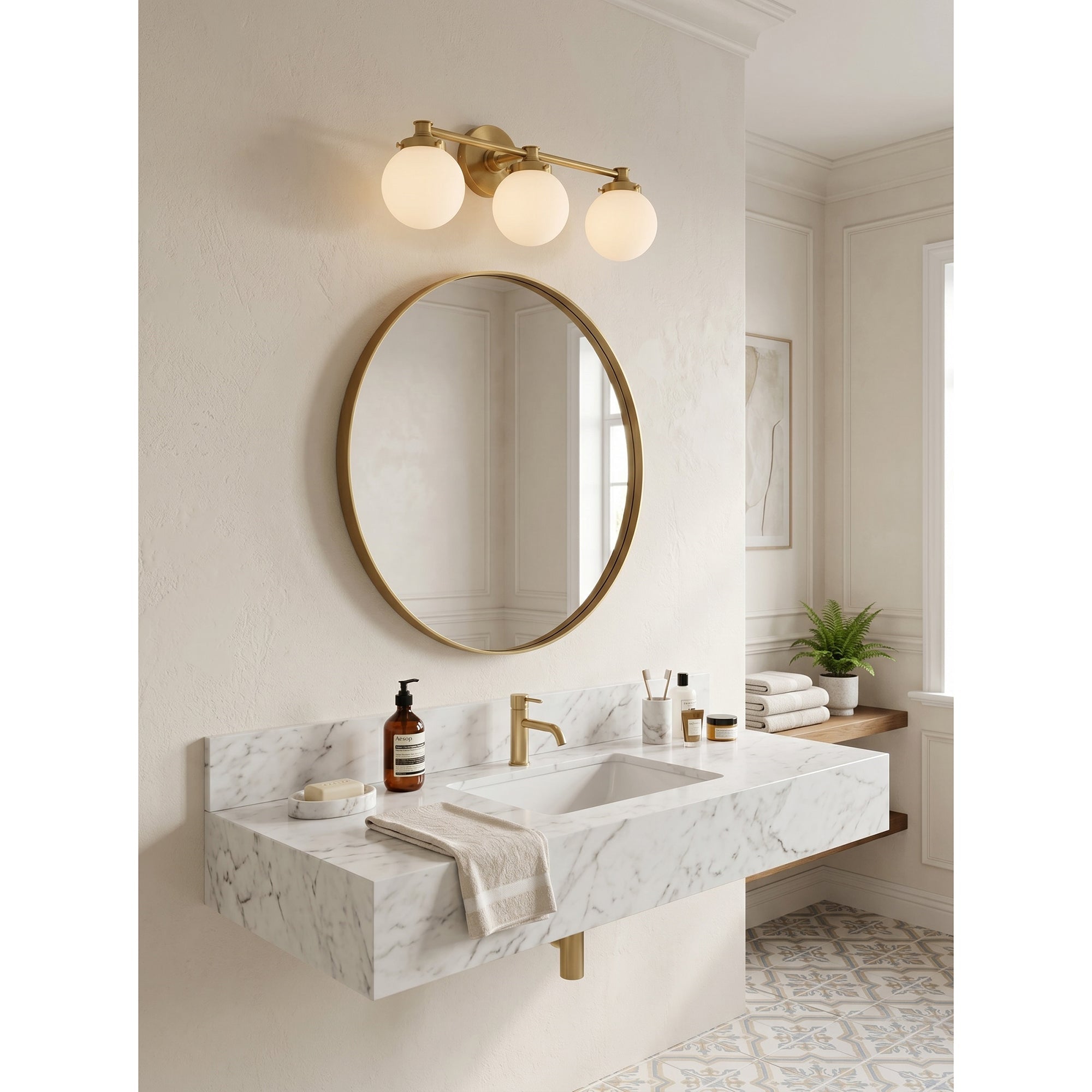 A lifestyle view of the Hayes sconce providing warm light in a powder room.