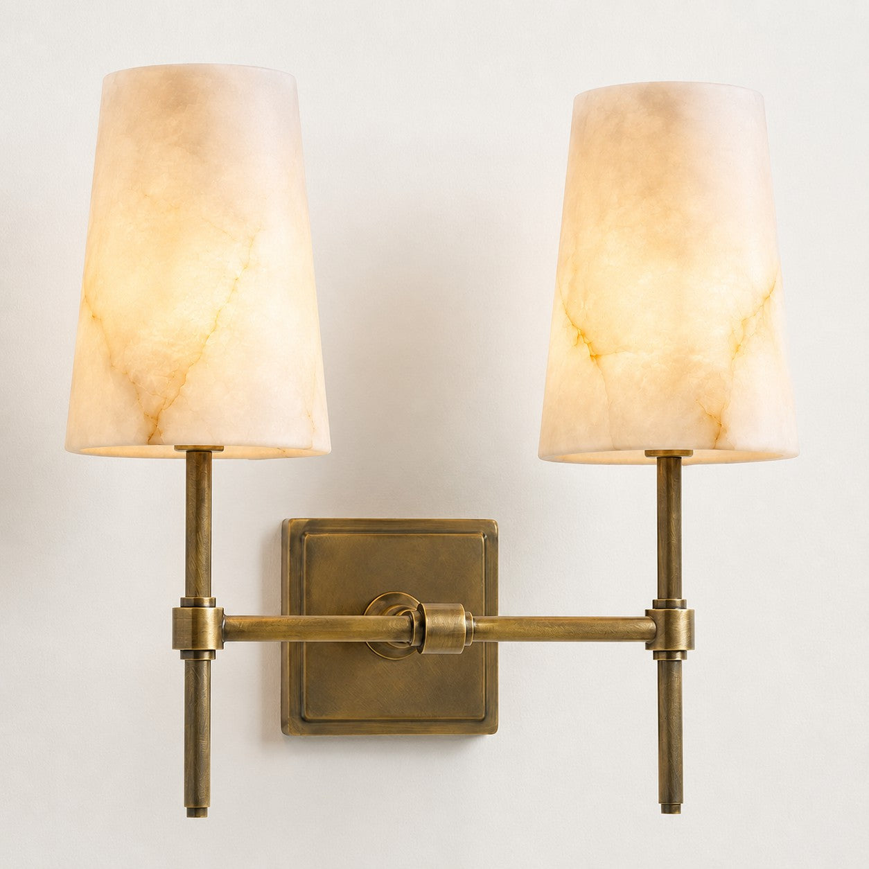 Front view of the two-head Hillsdale Alabaster Wall Sconce.