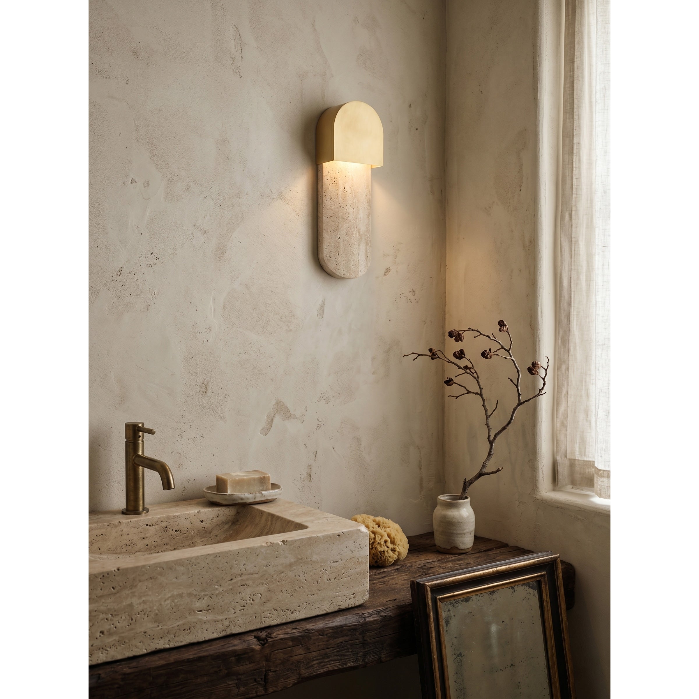 Side profile of the Hudson Wall Sconce showcasing its slim design.