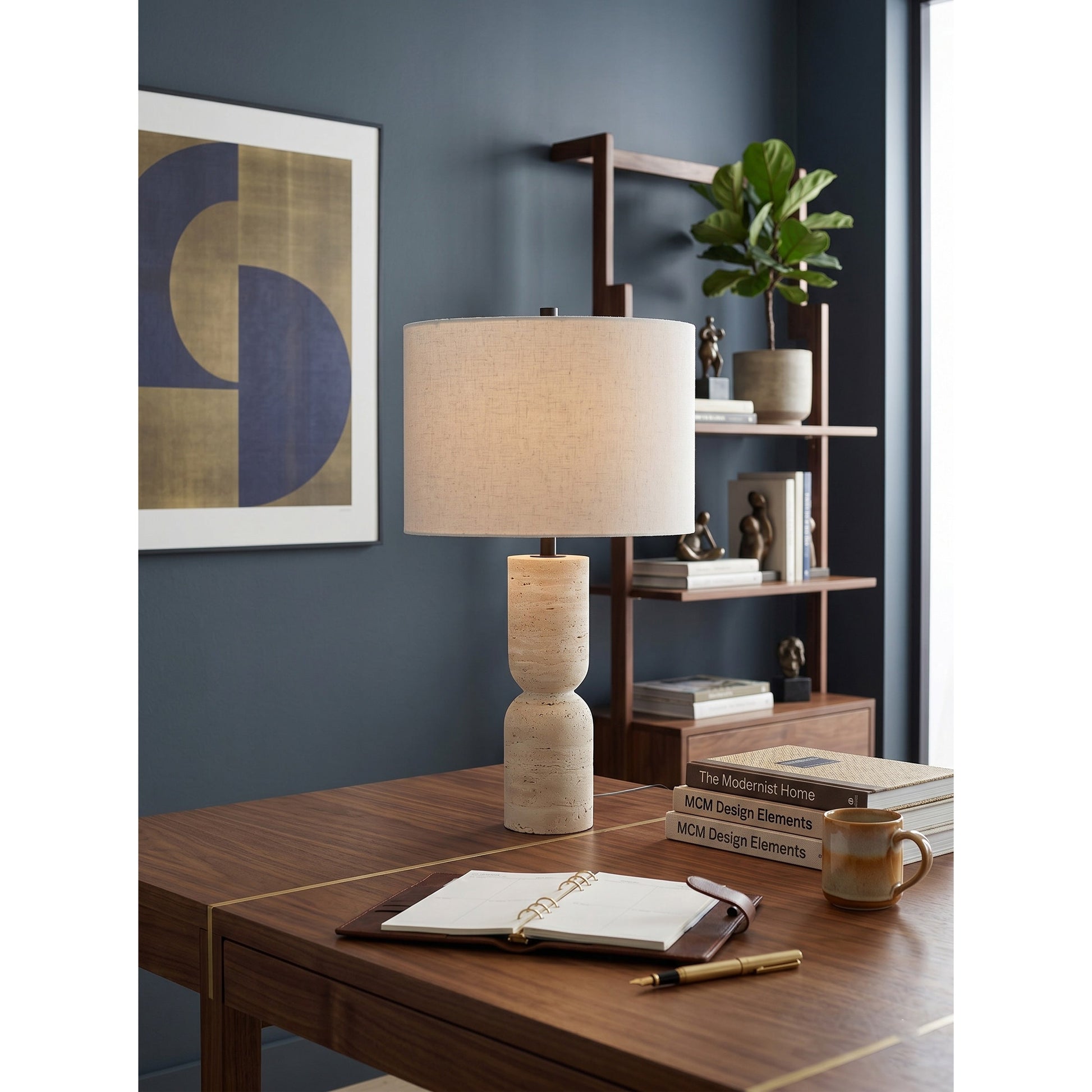 Jamia lamp styled on a sophisticated entryway console.