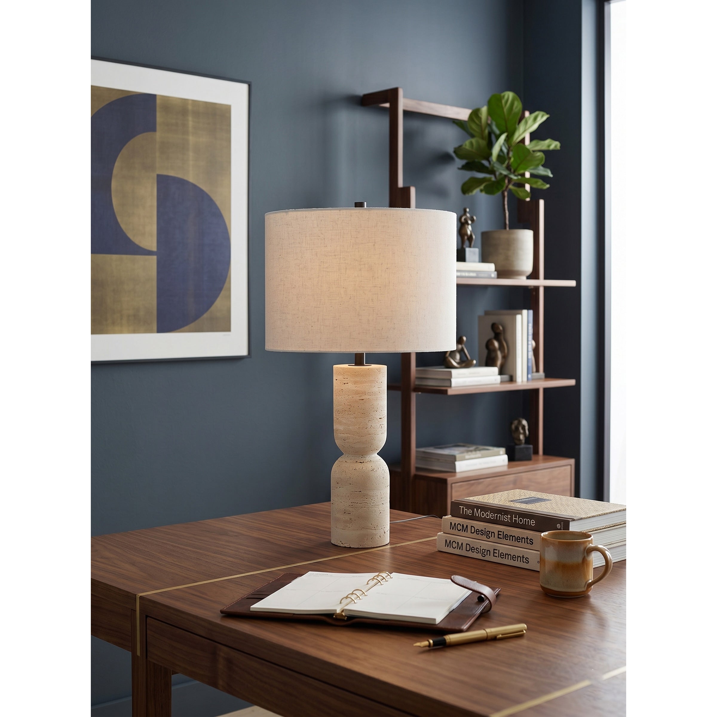 Jamia lamp styled on a sophisticated entryway console.
