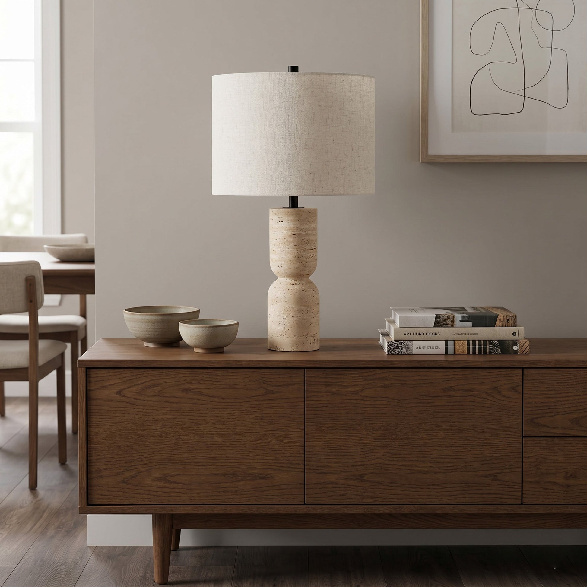 Jamia Table Lamp illuminated, casting a warm glow.