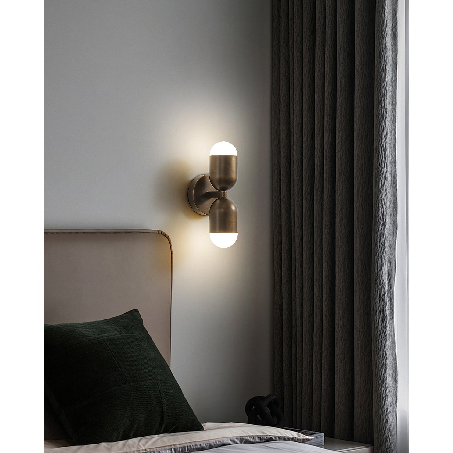 Lifestyle image of the Jensen Wall Sconce in a minimalist entryway.