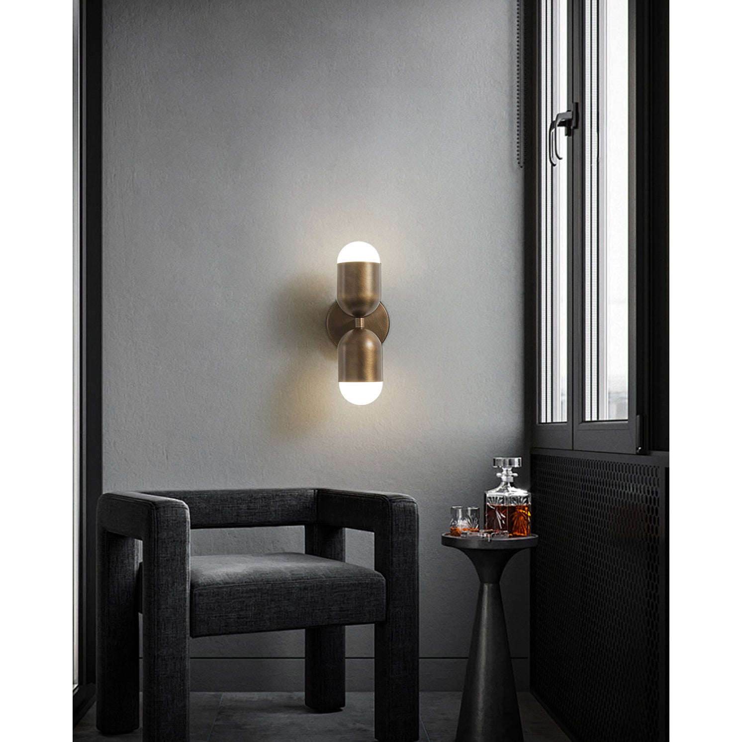 Angled view highlighting the sculptural form of the Jensen Wall Sconce.