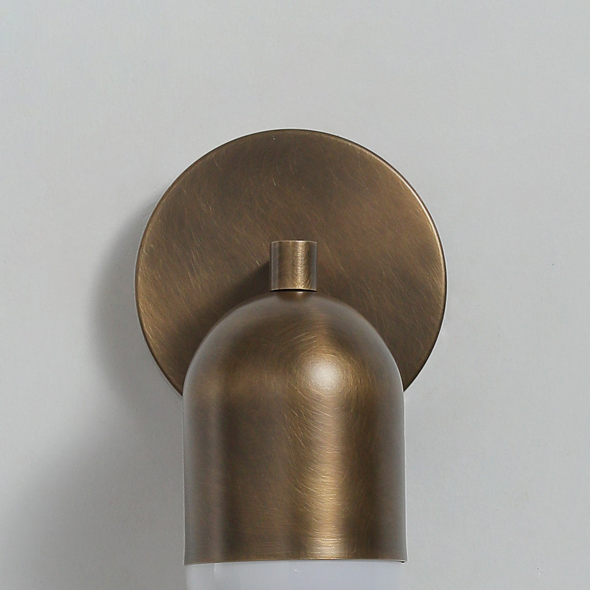 The Jensen Wall Sconce unlit, showing its form and finish.