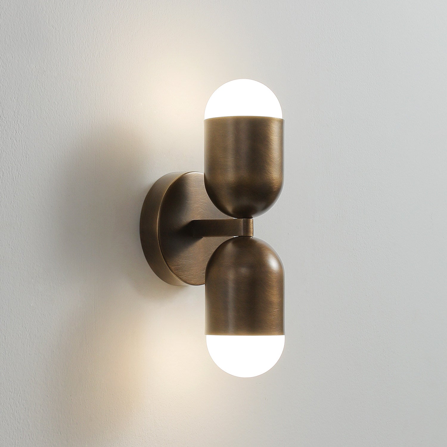 Minimalist living room with the Jensen Wall Sconce as an accent light.