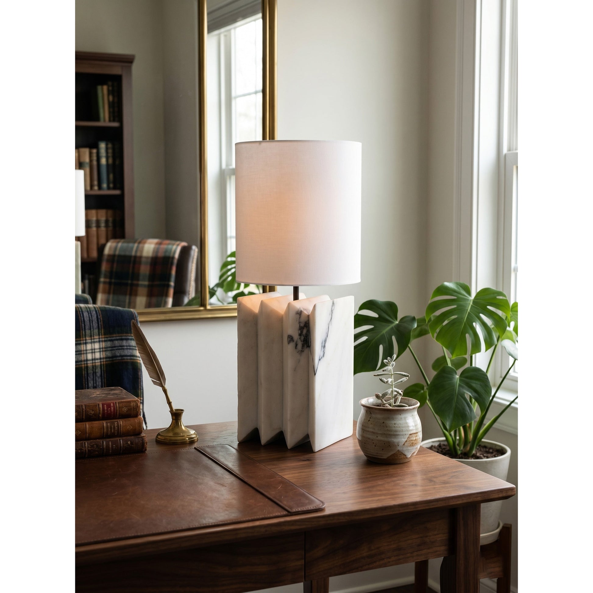 The Jman Marble Table Lamp placed on a sophisticated executive desk.