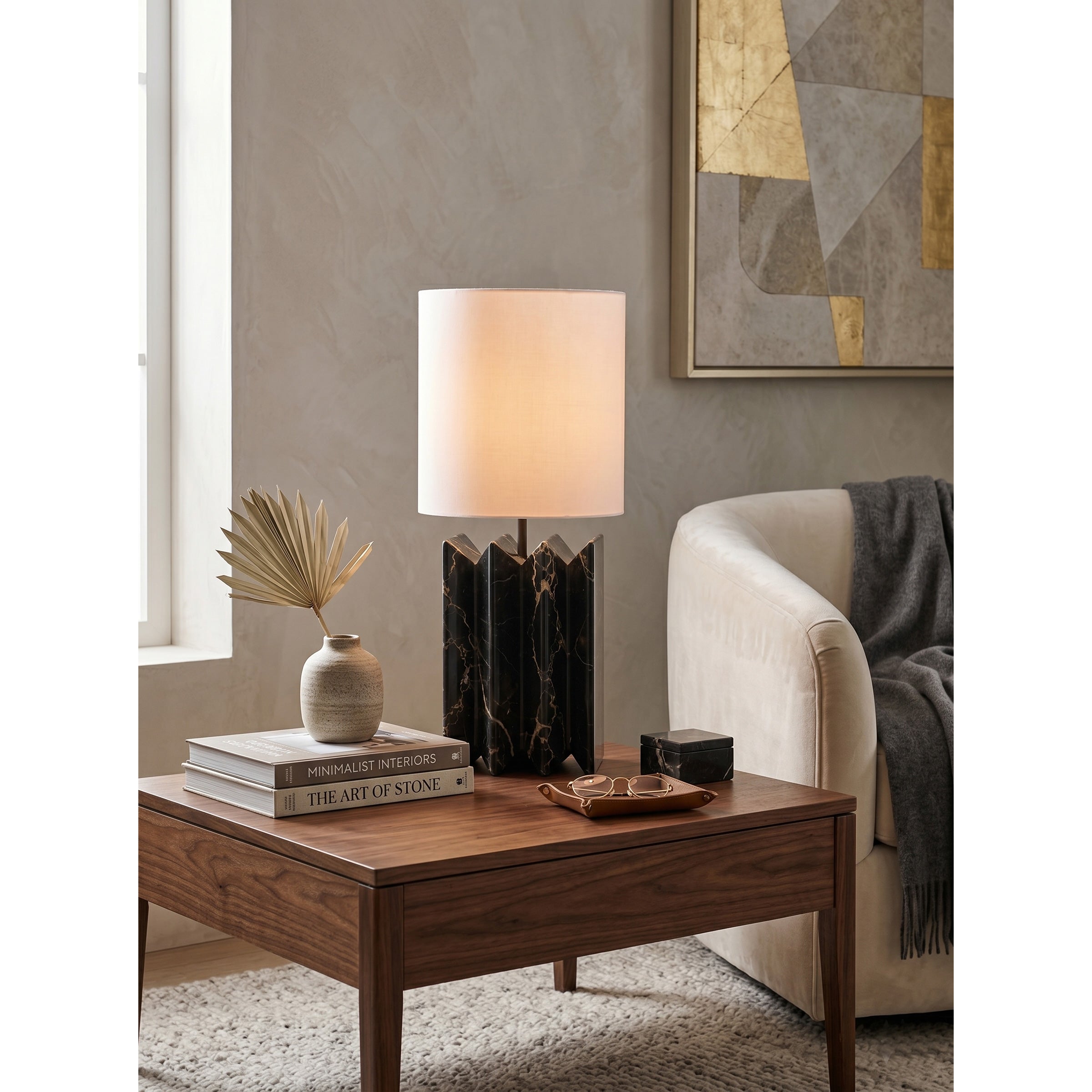 The Jman Table Lamp illuminating a minimalist entryway console table.