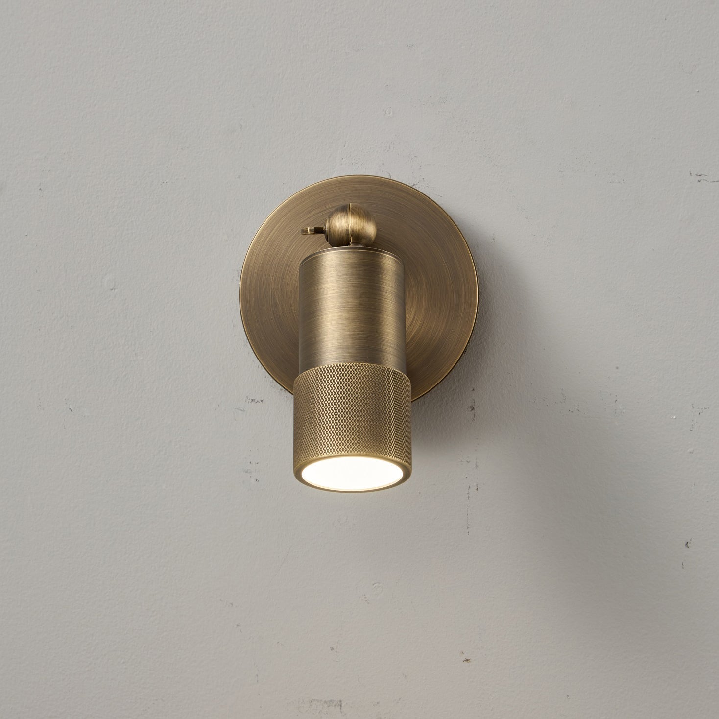 The warm 4500K light from the Jura Wall Sconce's integrated LED.