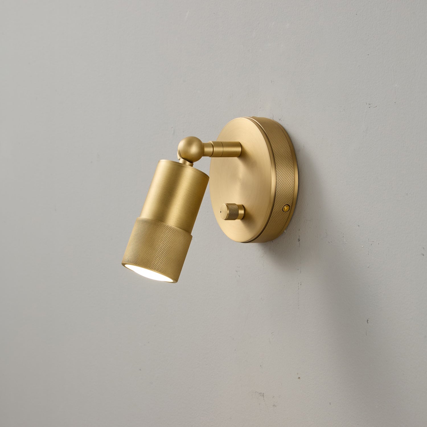 Product shot of the Jura Wall Sconce on a neutral background.