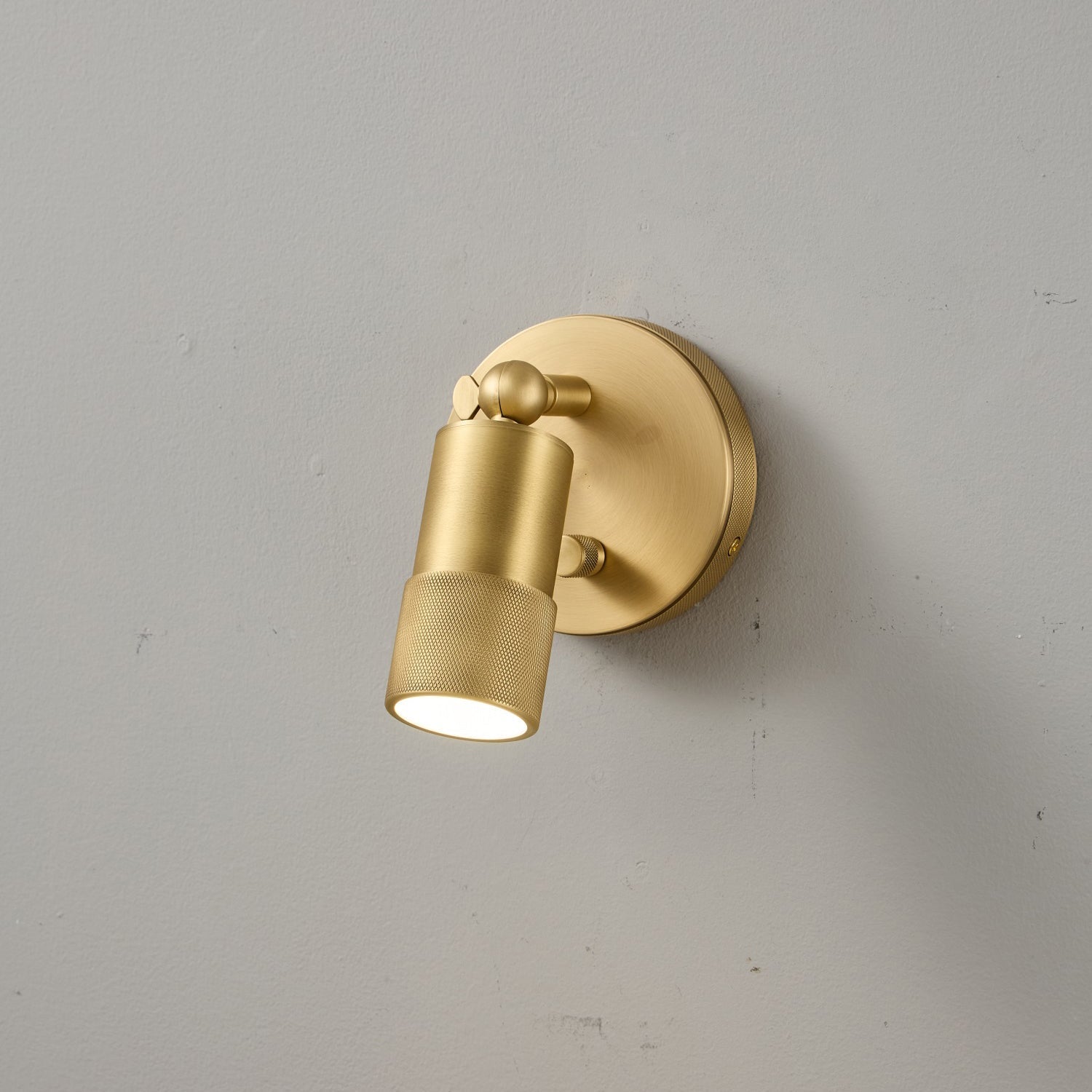 The elegant silhouette of the Jura Wall Sconce.