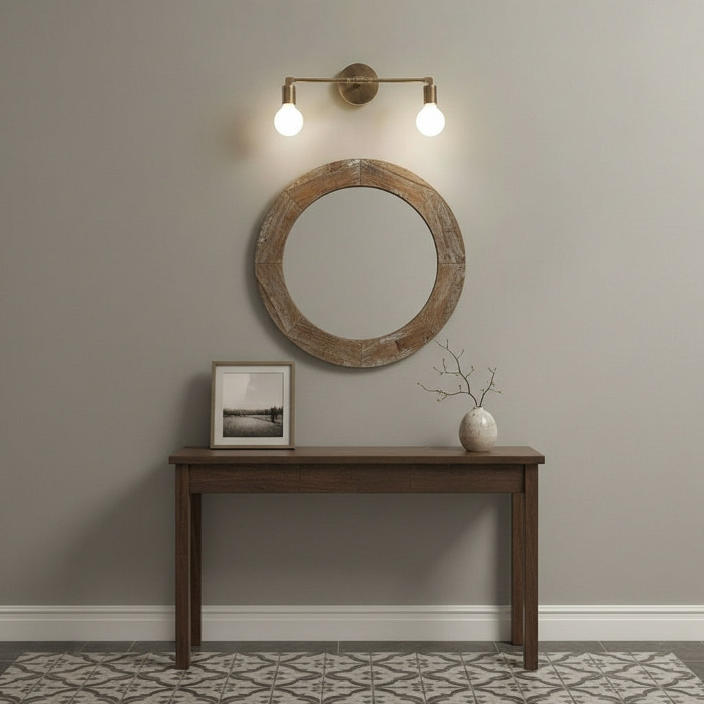 Front view of the Karma Double Wall Sconce against a white wall.