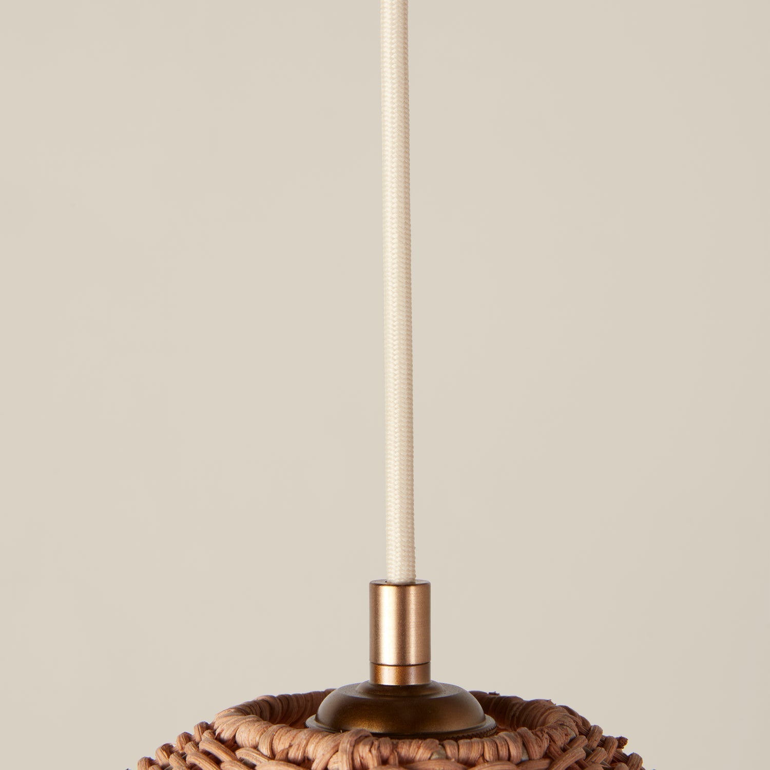The pendant lamp shown unlit to highlight its craftsmanship.