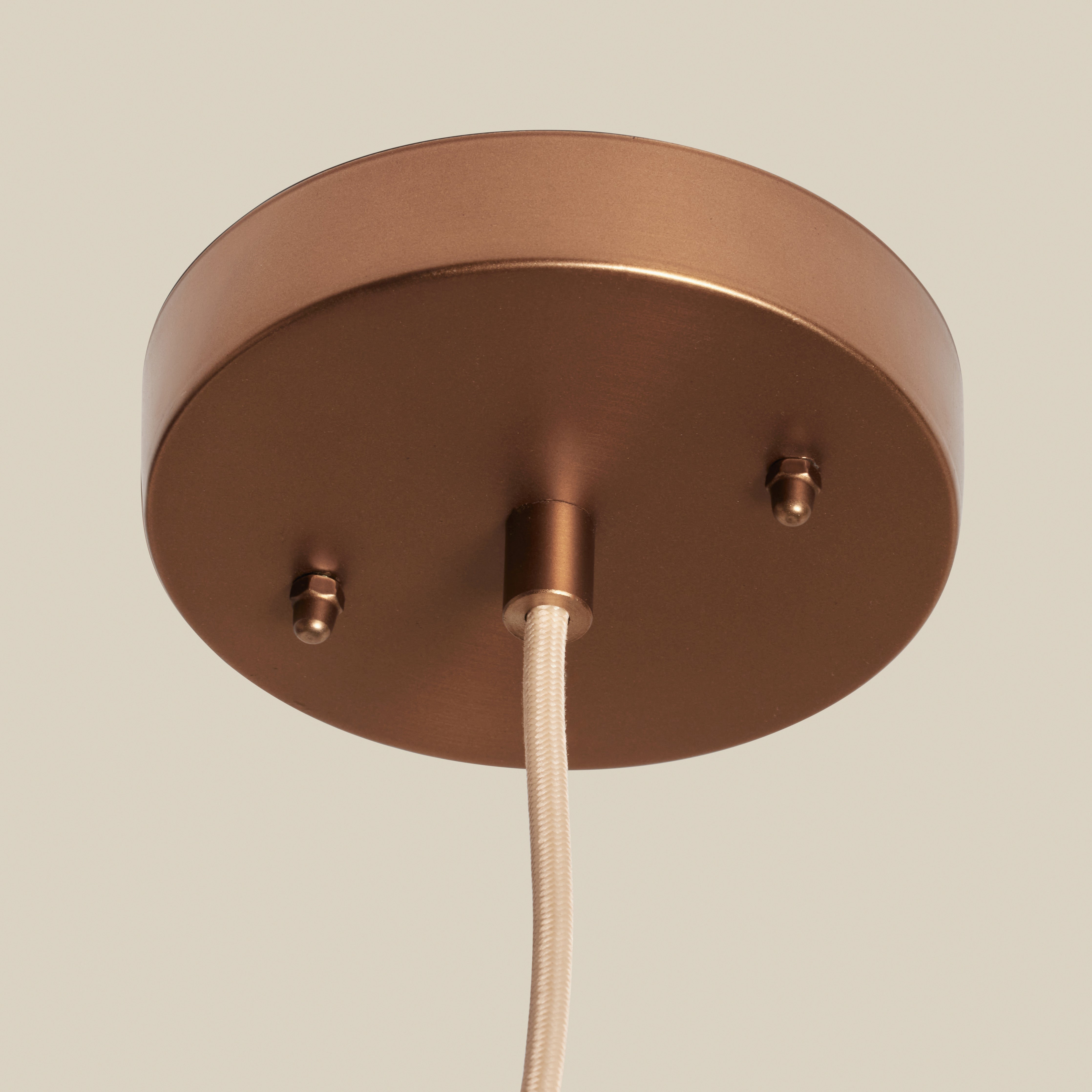 The Kasbah Rattan Conical Pendant Lamp from a distance.