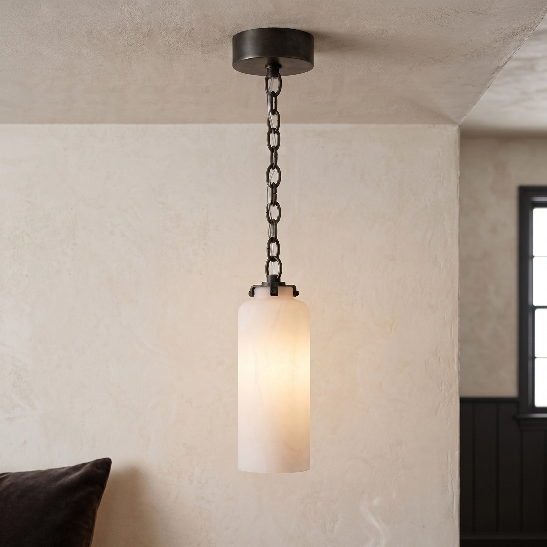 Close-up of the frosted cylinder glass shade on the Katie Pendant Lamp.