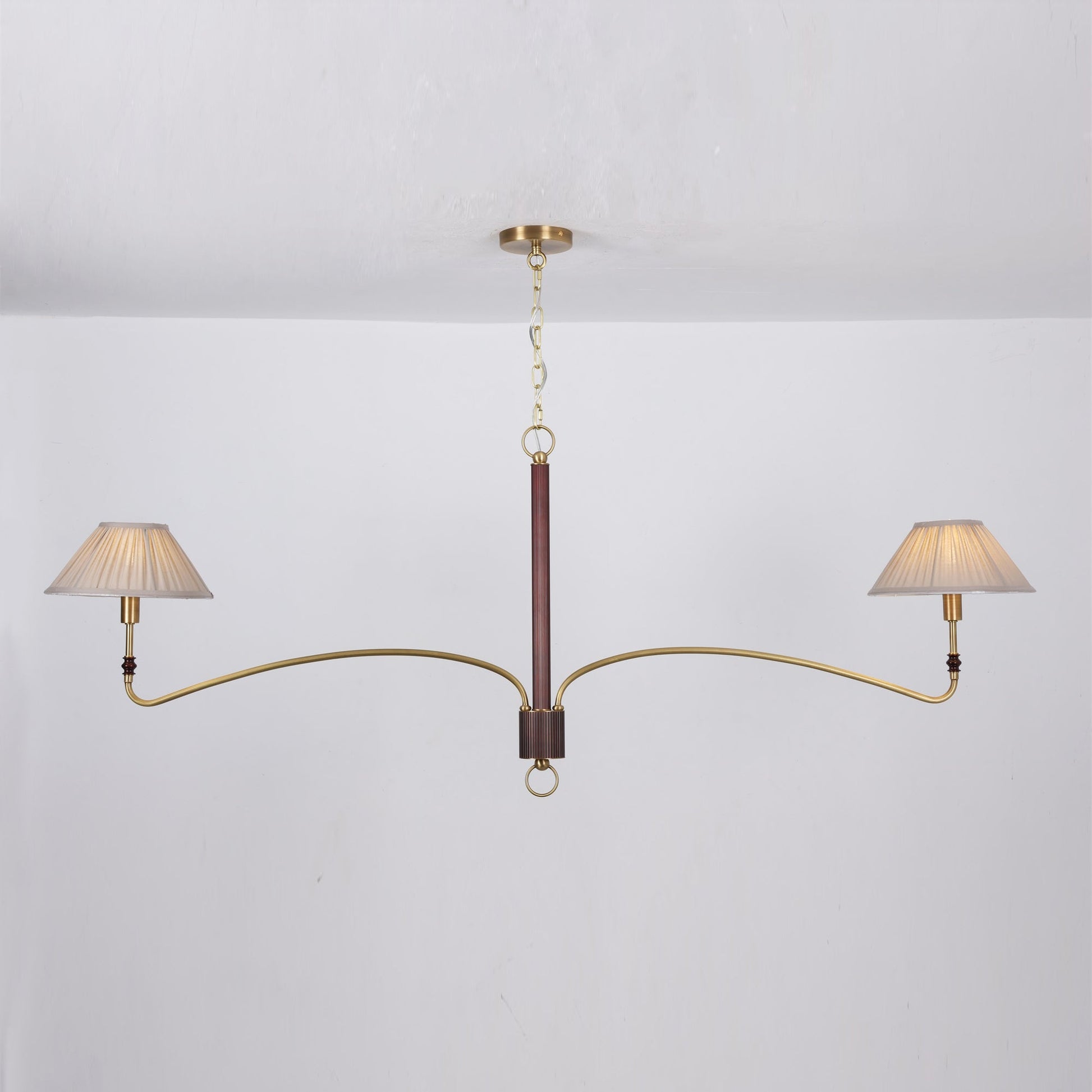 The chandelier shown with lights on, creating a warm glow.