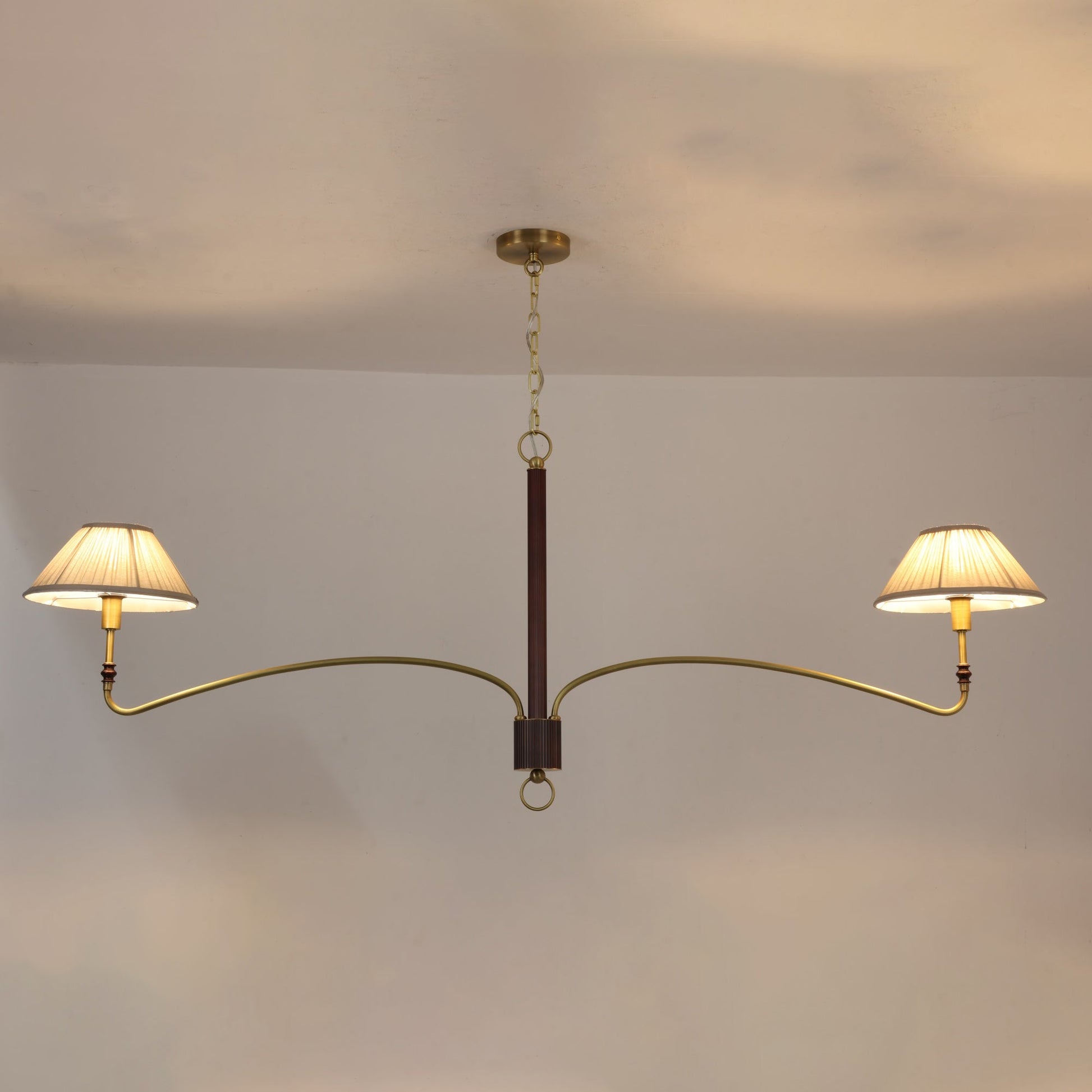 Detail of the connection between the brass arm and the central column.