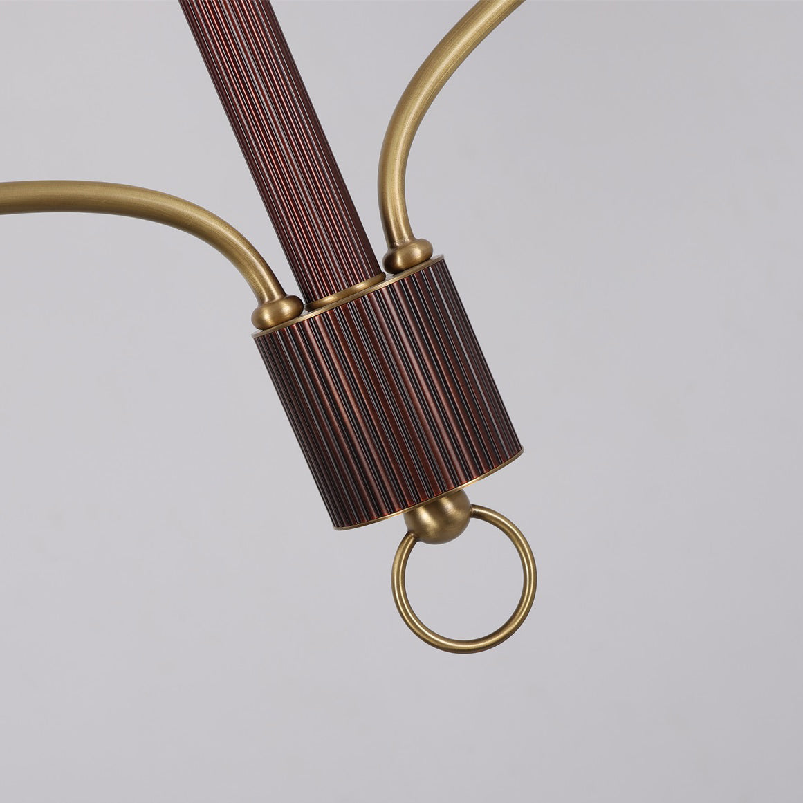 The red bronze finish of the Laurent Chandelier in a warm-toned room.