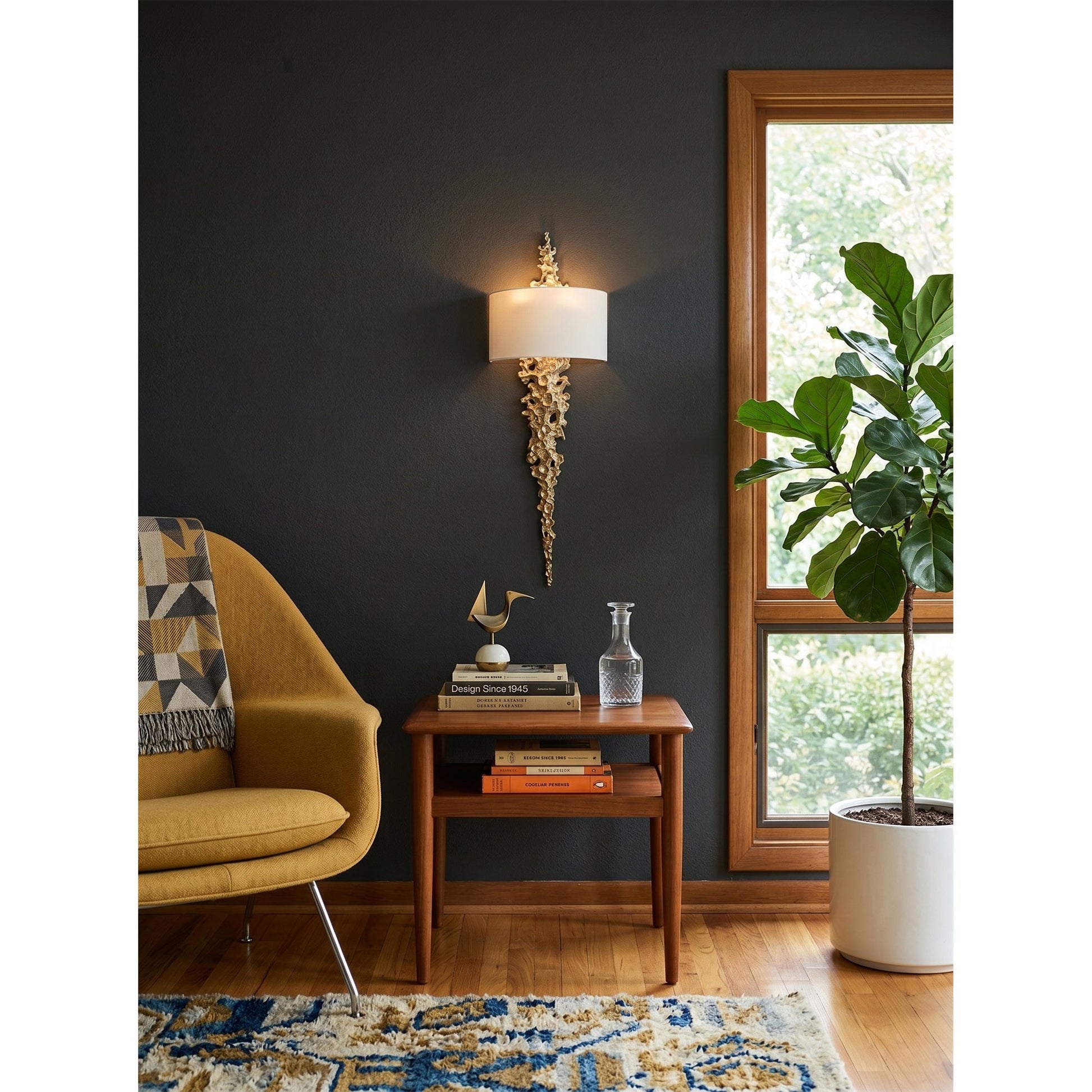 A pair of Lava Brass Wall Sconces flanking a modern fireplace.