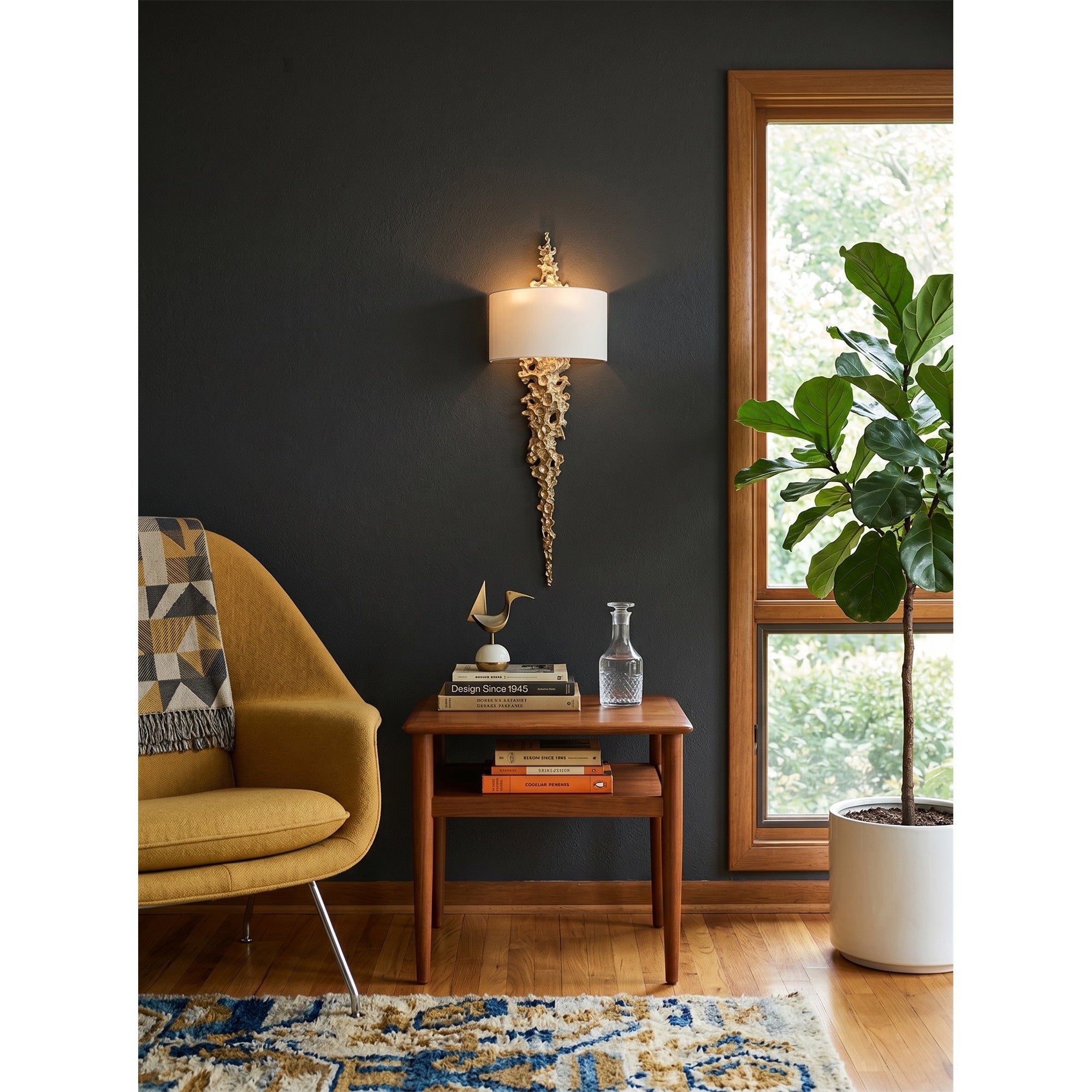 A pair of Lava Brass Wall Sconces flanking a modern fireplace.