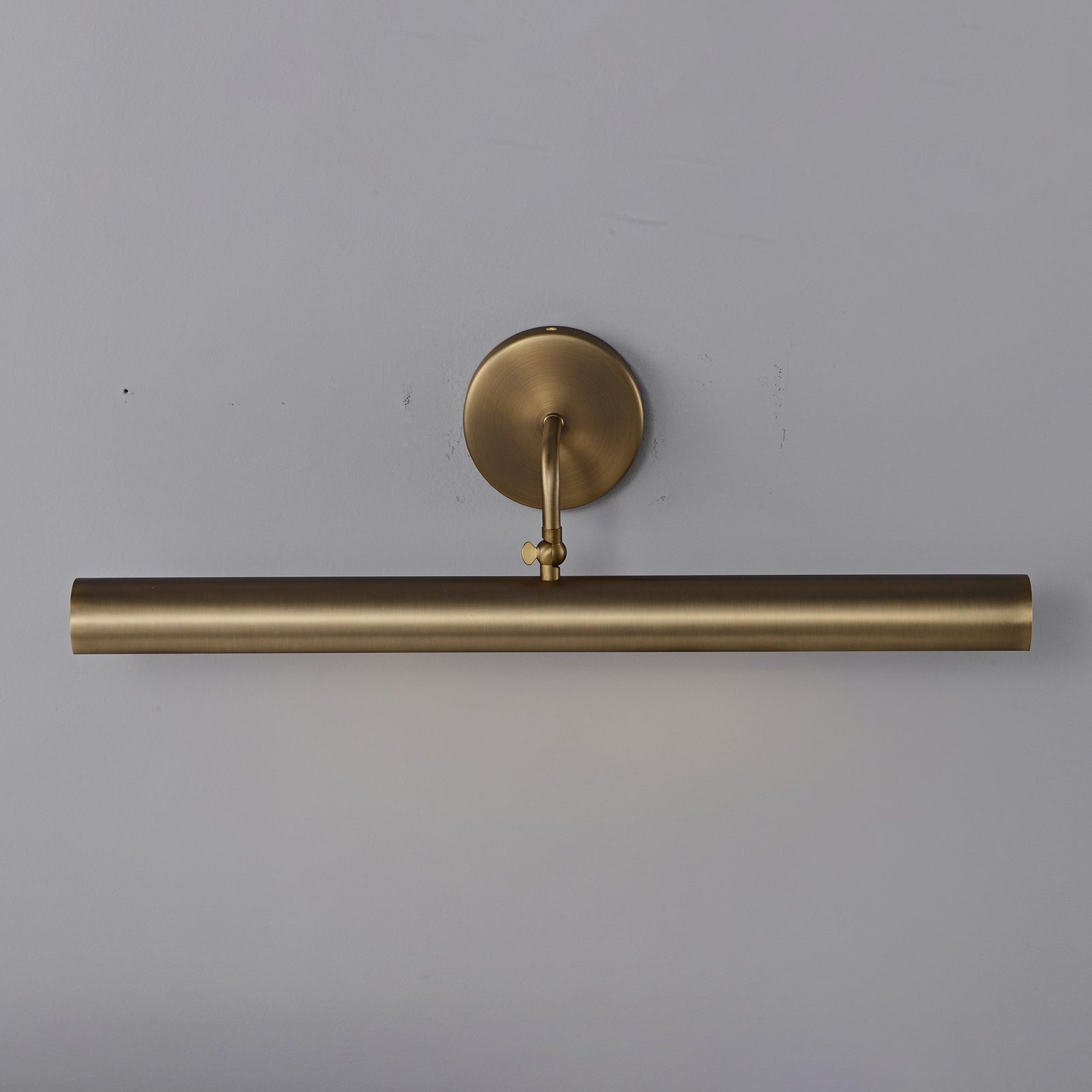 Loxen Wall Sconce in a mid-century modern living room.