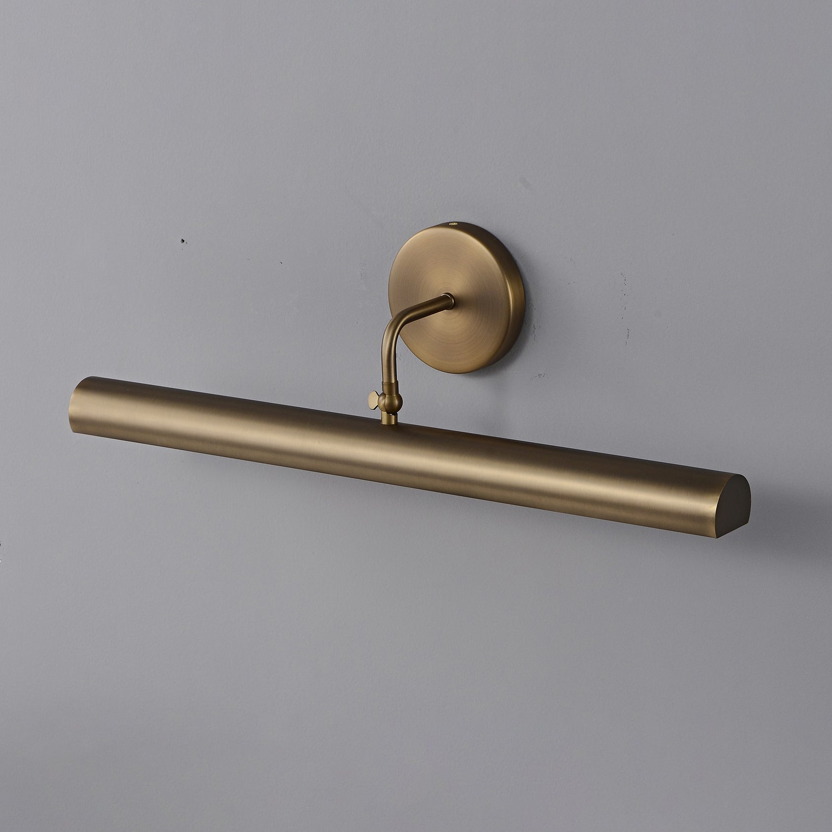 The linear silhouette of the Loxen Wall Sconce.
