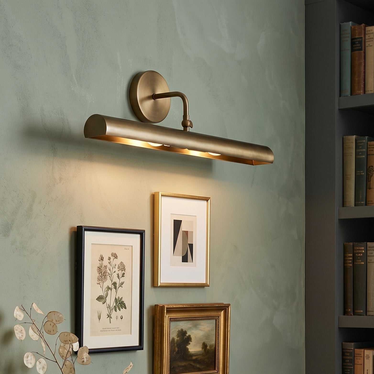 Angled view of the Loxen Wall Sconce, highlighting its sleek iron body.