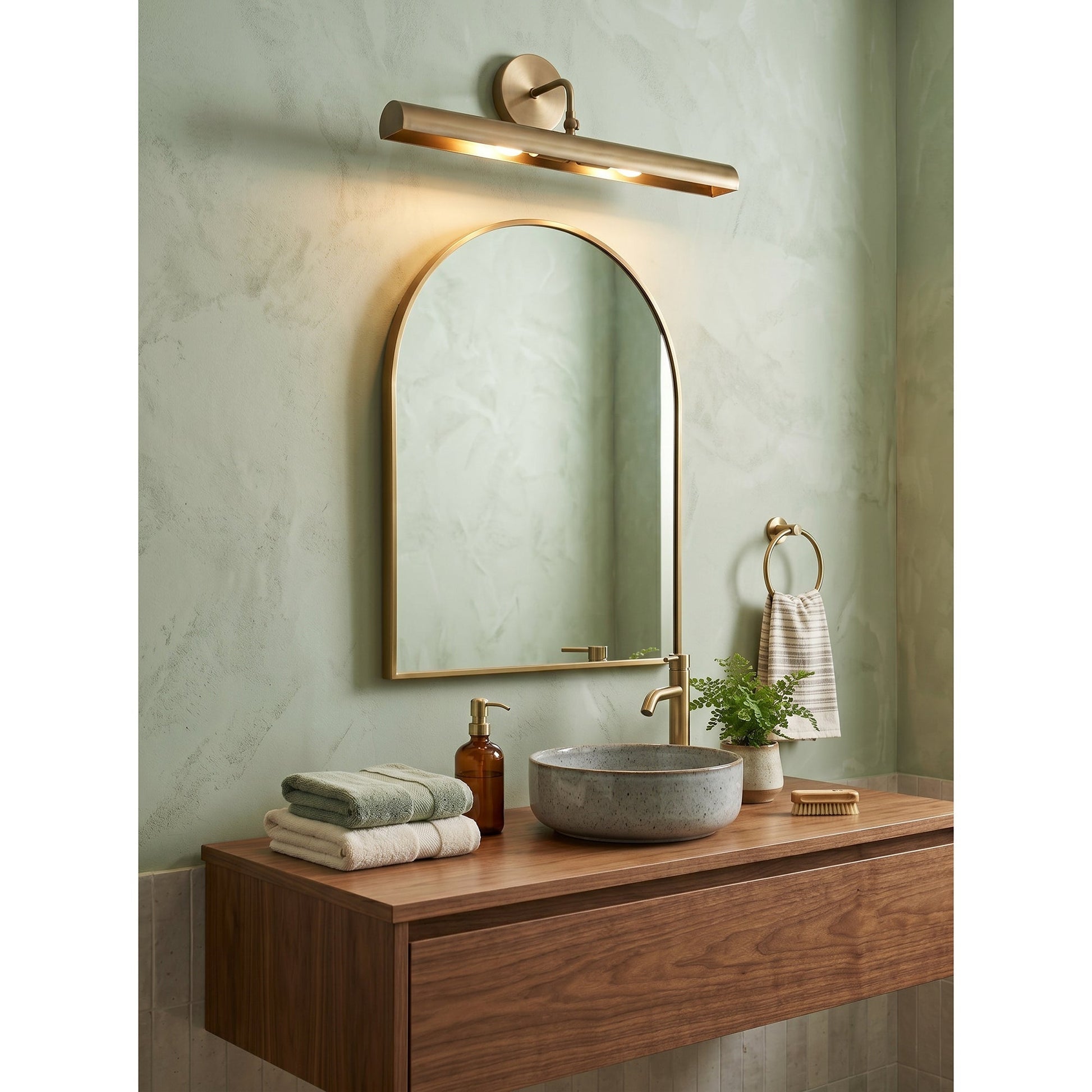 Loxen Wall Sconce shown in a hallway setting.