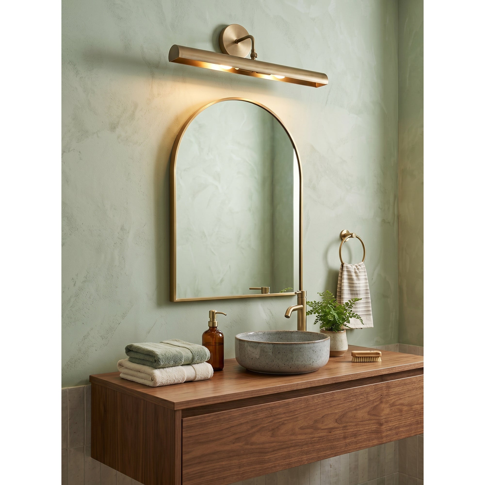 Loxen Wall Sconce shown in a hallway setting.