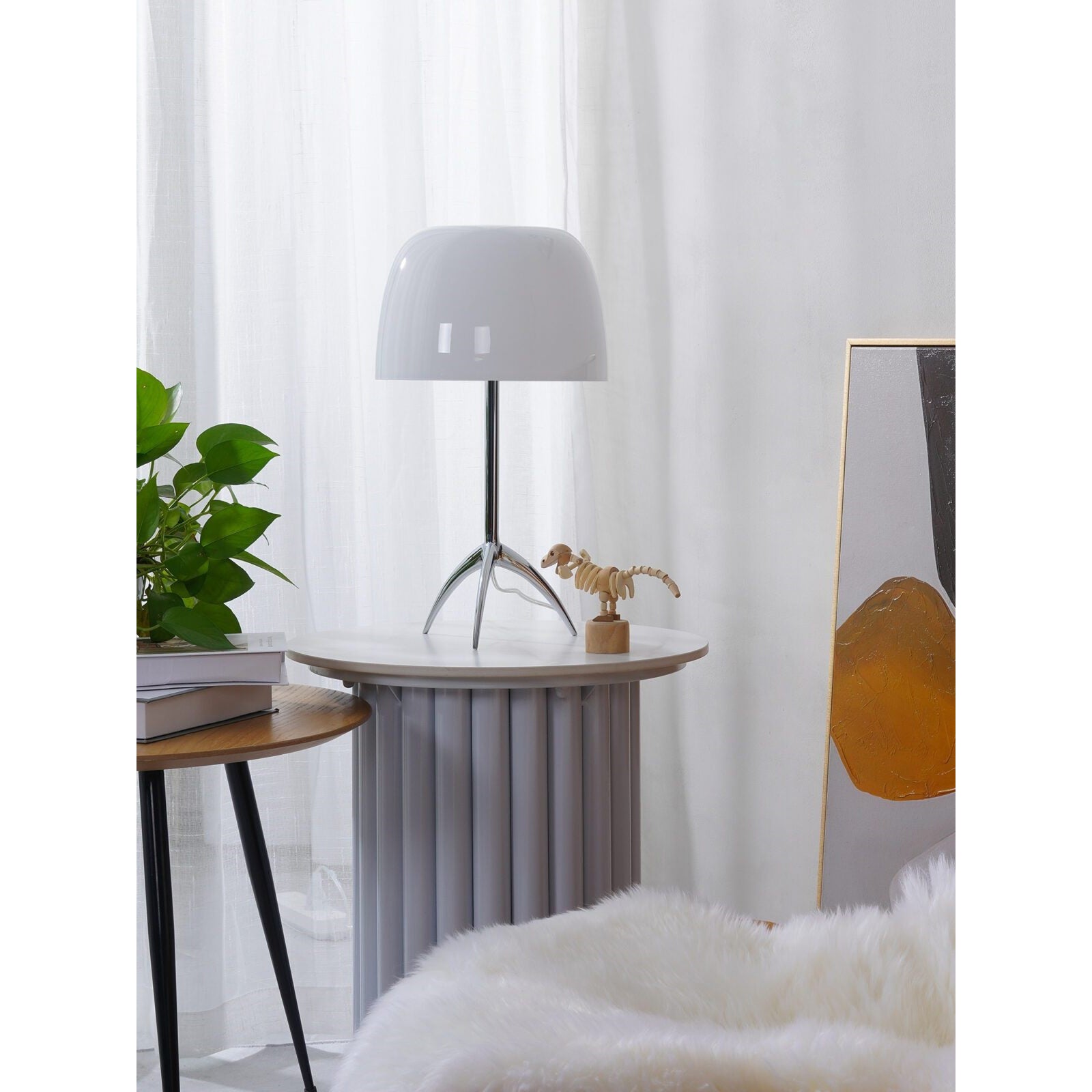The Lumiere Table Lamp against a light background.