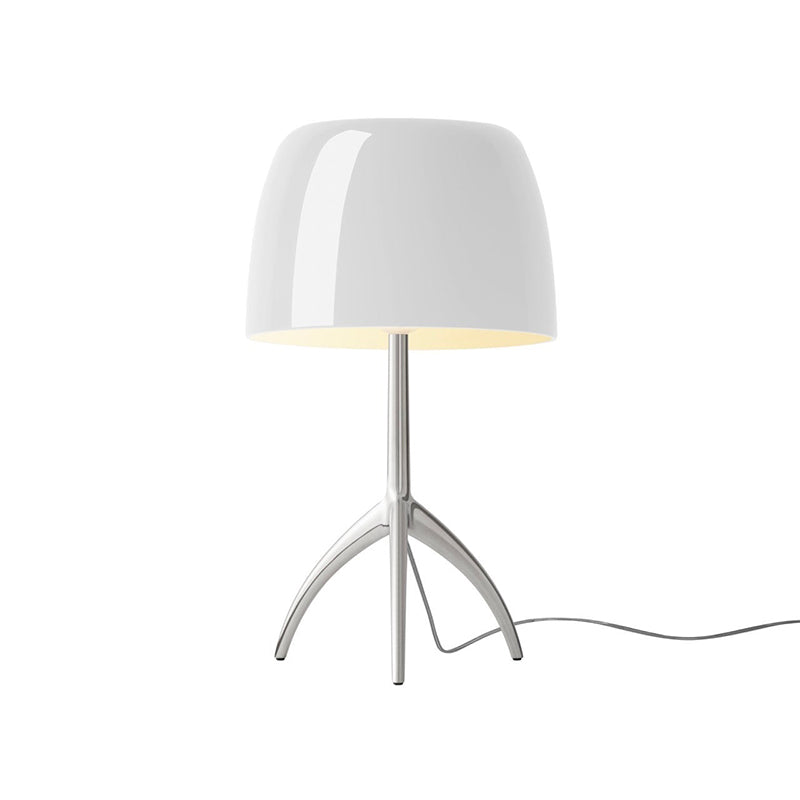 The red Lumiere Table Lamp in a retro-inspired interior.