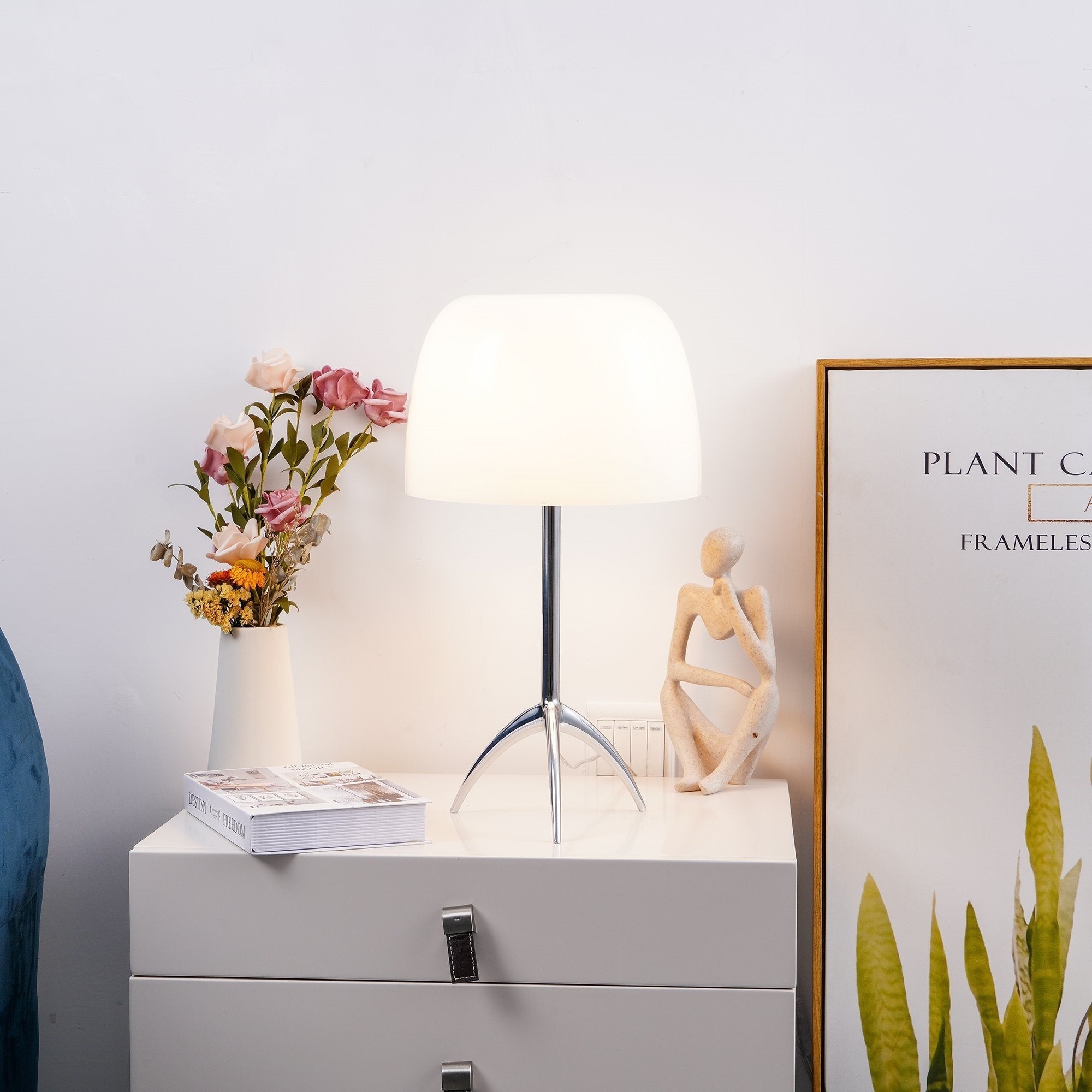 Ambient lighting from the Lumiere Table Lamp in an entryway.