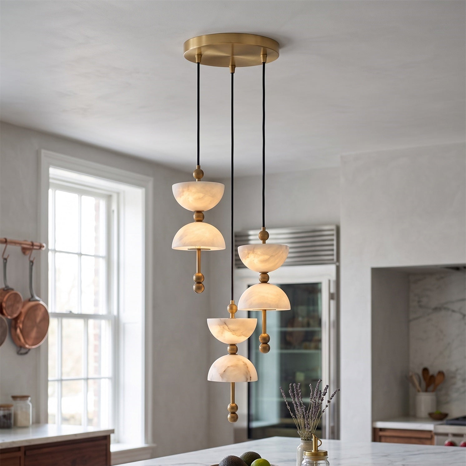 Detail shot of the brushed brass hardware on the Lyra Alabaster Chandelier.