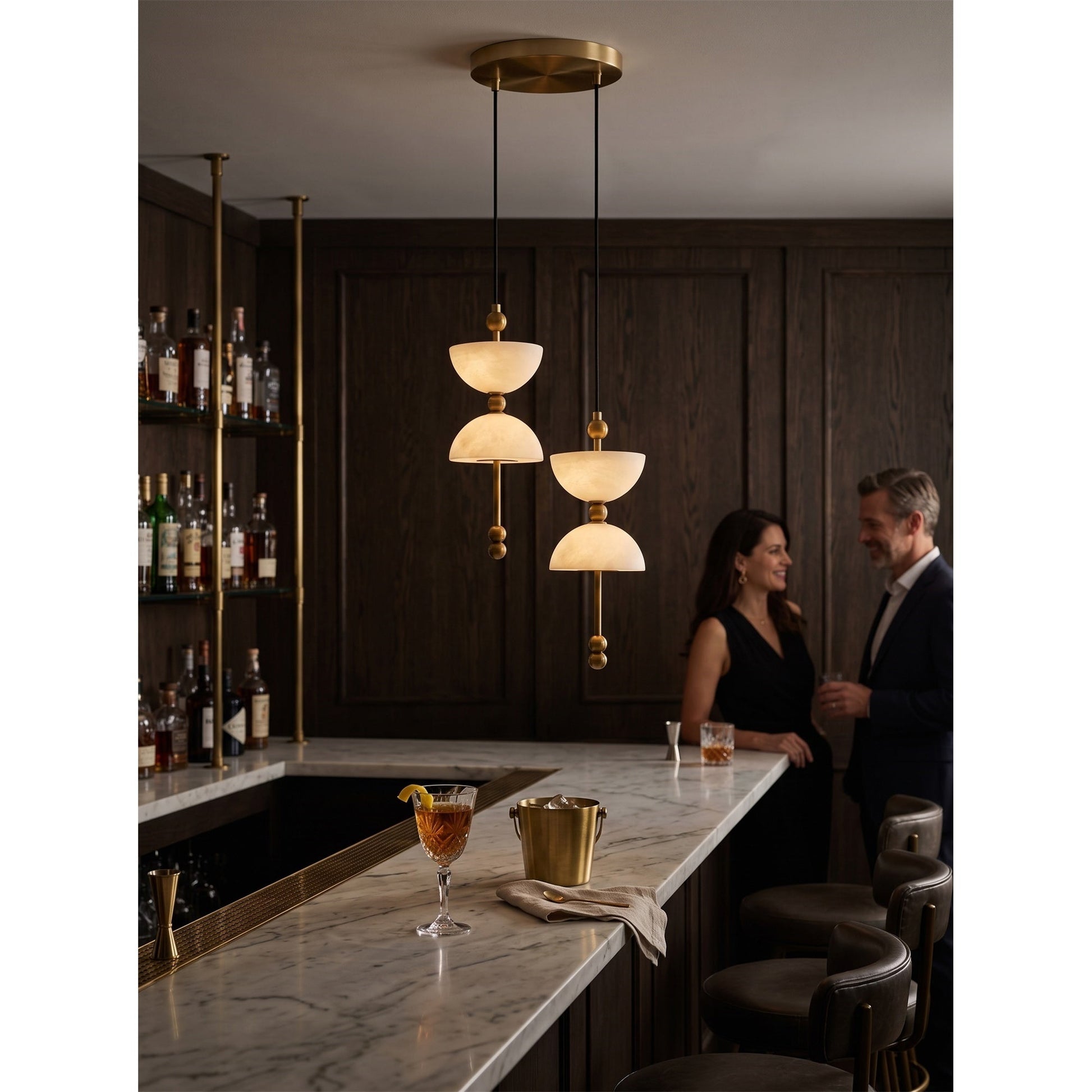 Angled view of the Lyra Alabaster Chandelier, showing the staggered geometric composition.