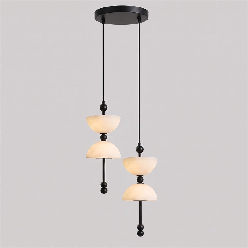 Detail shot of the brushed brass hardware on the Lyra Alabaster Chandelier.