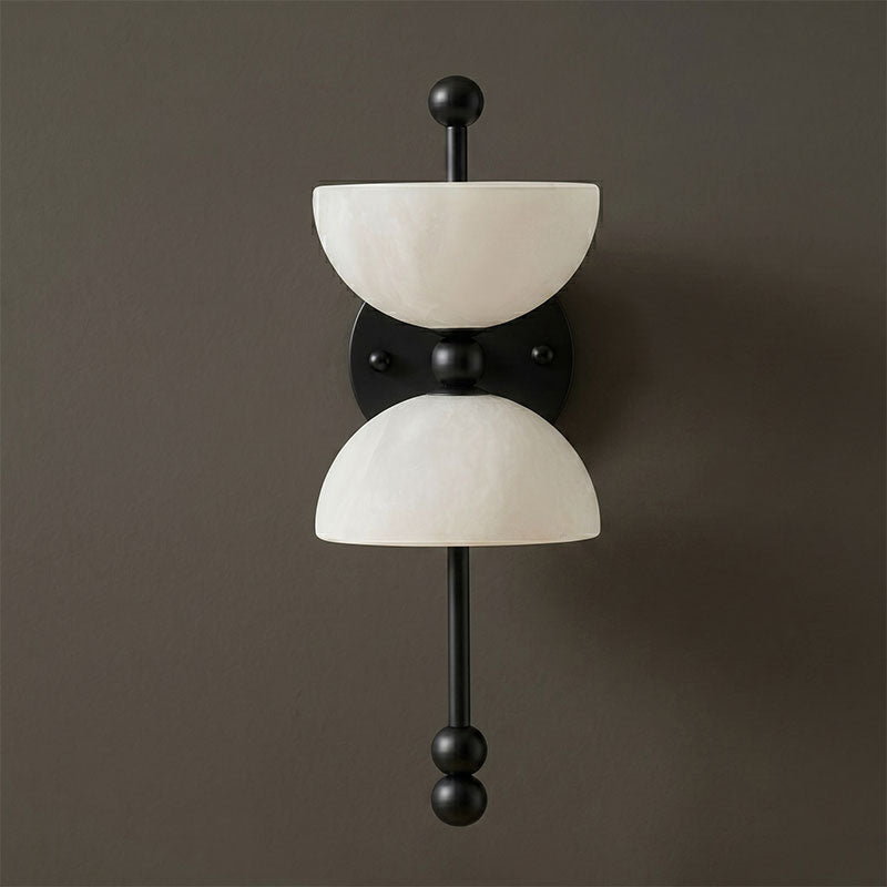 The lamp casting a soft, ambient light on a wall.