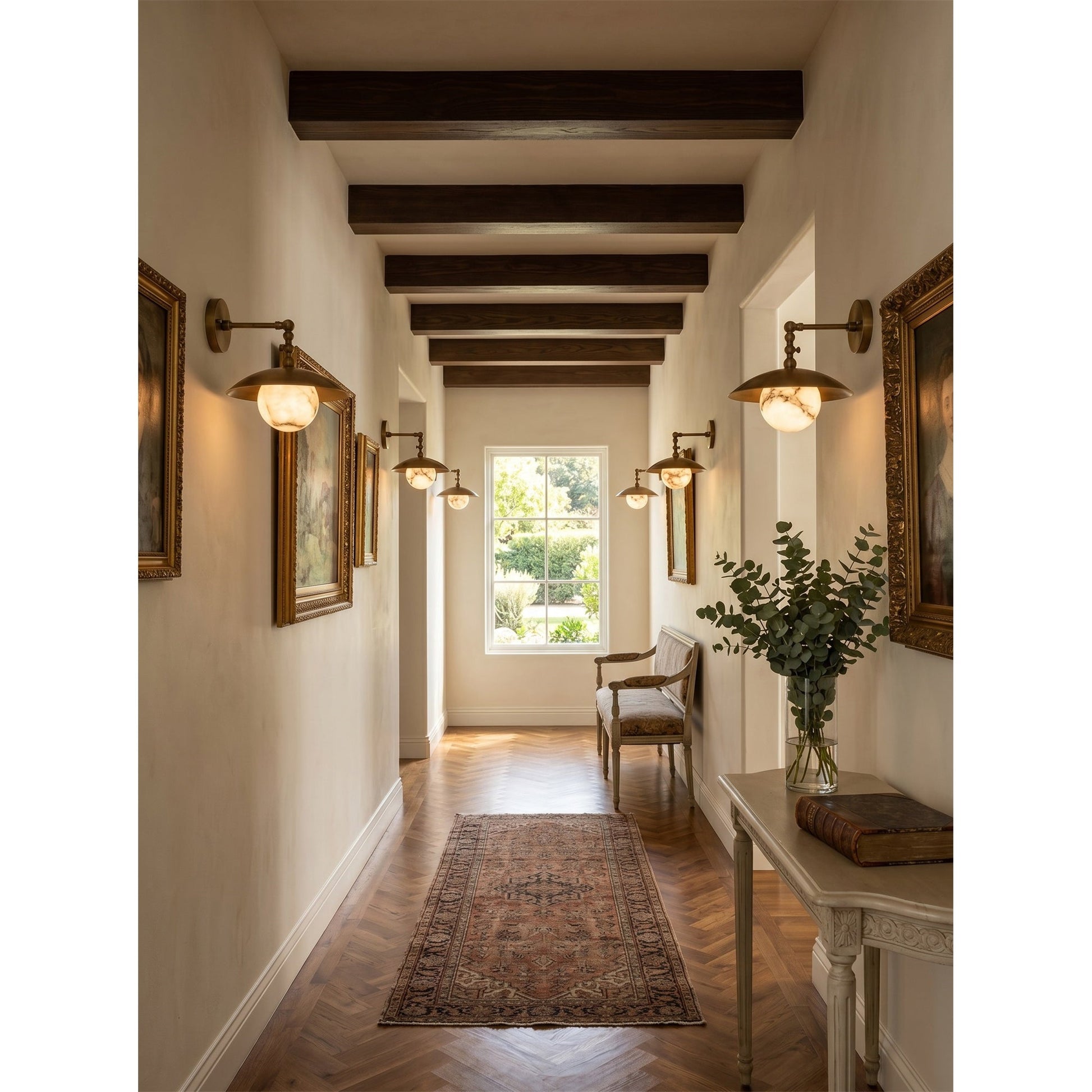 The wall sconce shown with the light turned on, highlighting the warm diffusion.