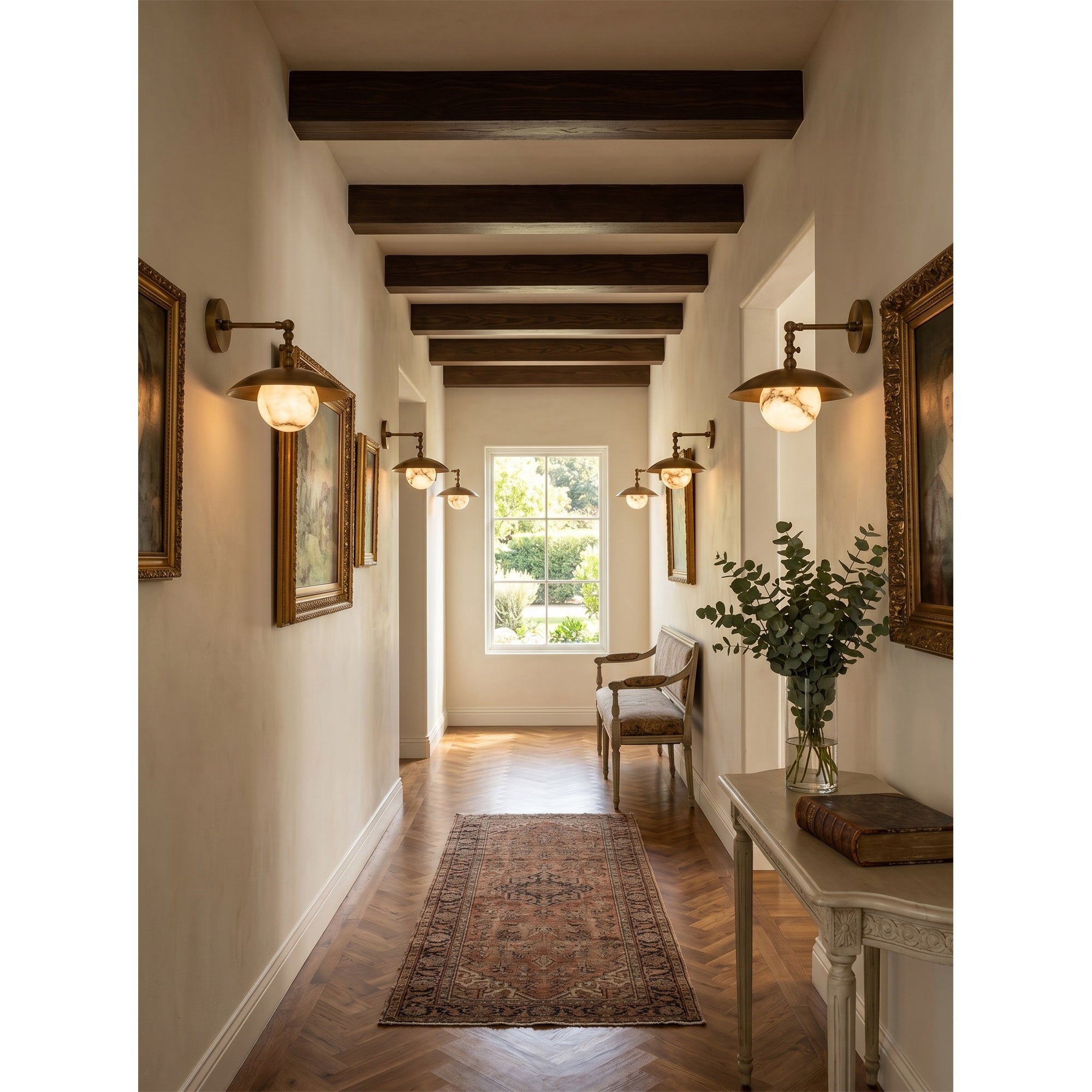 The wall sconce shown with the light turned on, highlighting the warm diffusion.