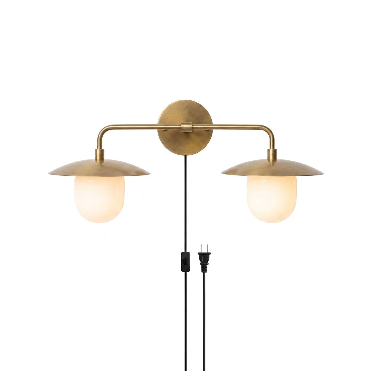 Marie Petite Plug-in Wall Sconce in antique brass finish.
