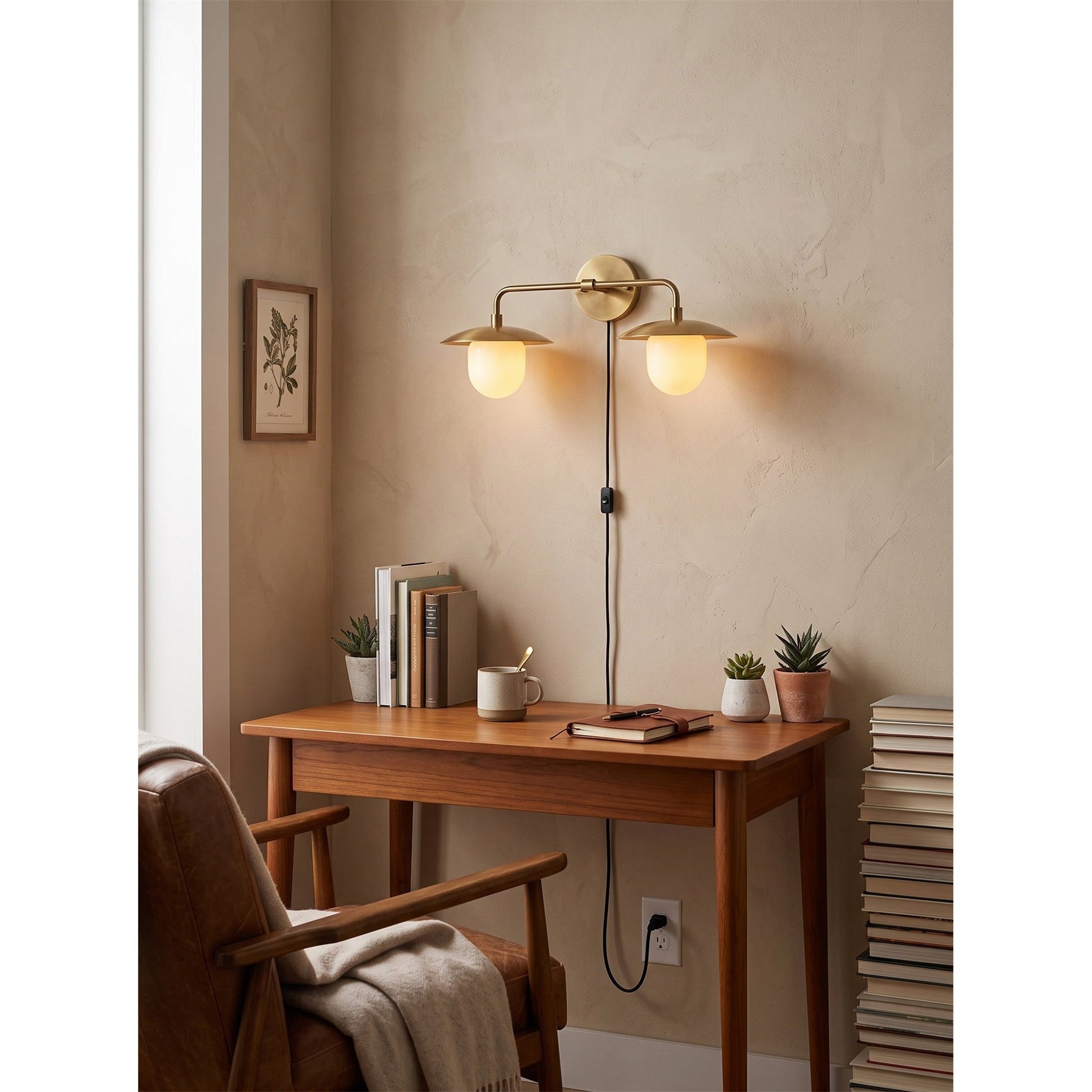 A pair of Marie wall sconces flanking a bedroom headboard.