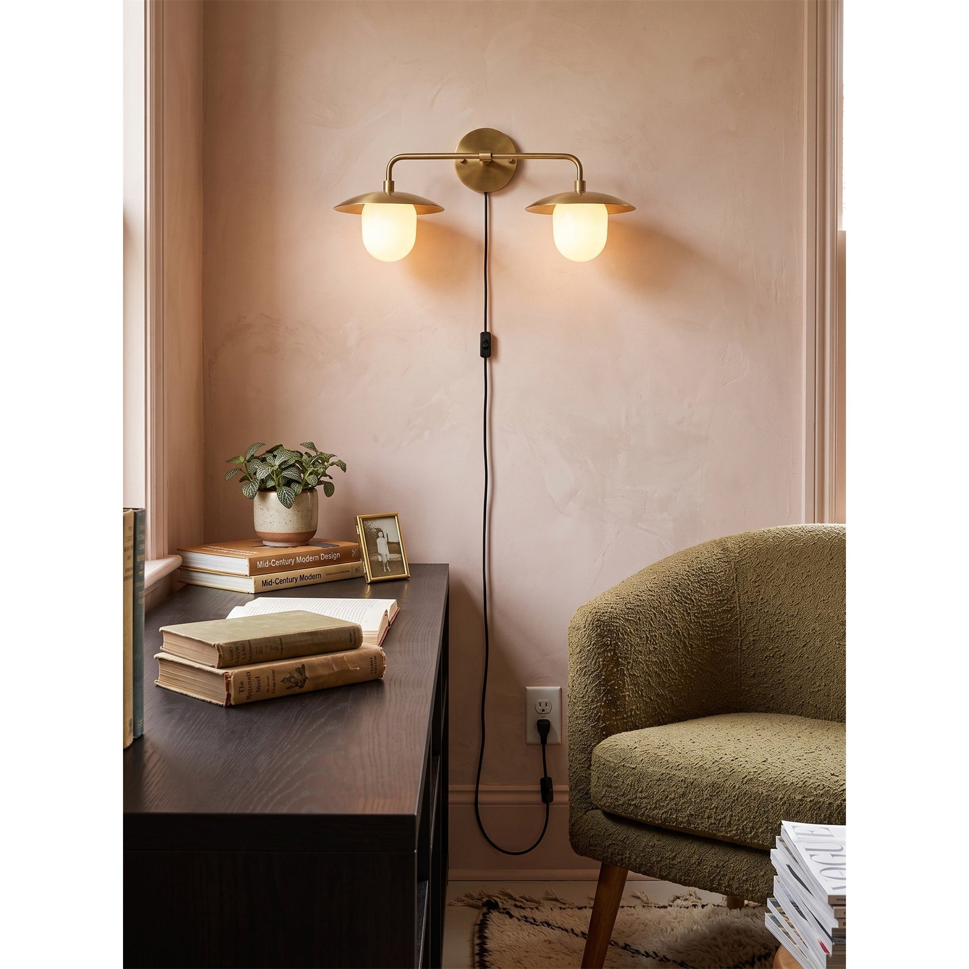 Detail shot of the antique brass linear arm and plug-in cord.