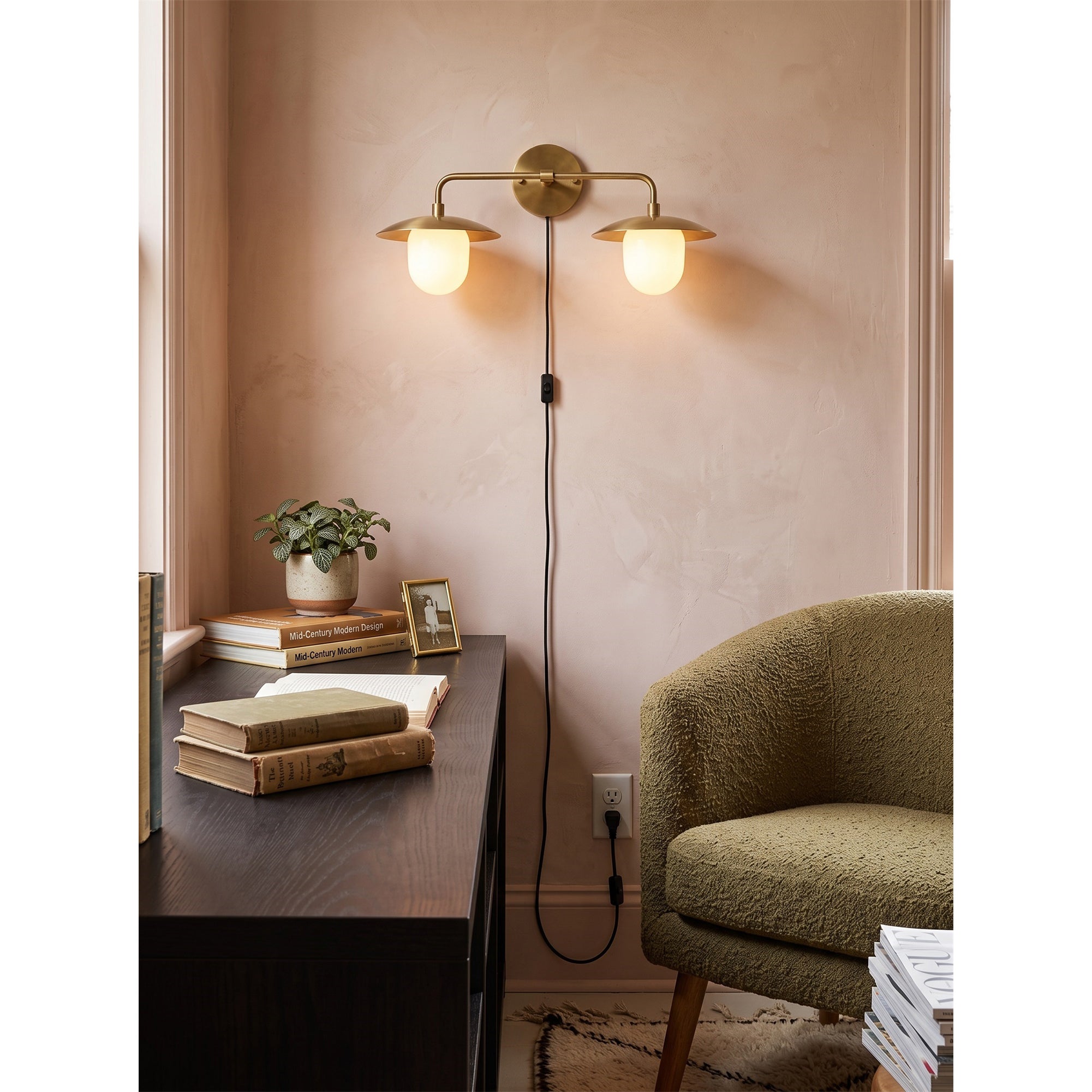 Detail shot of the antique brass linear arm and plug-in cord.