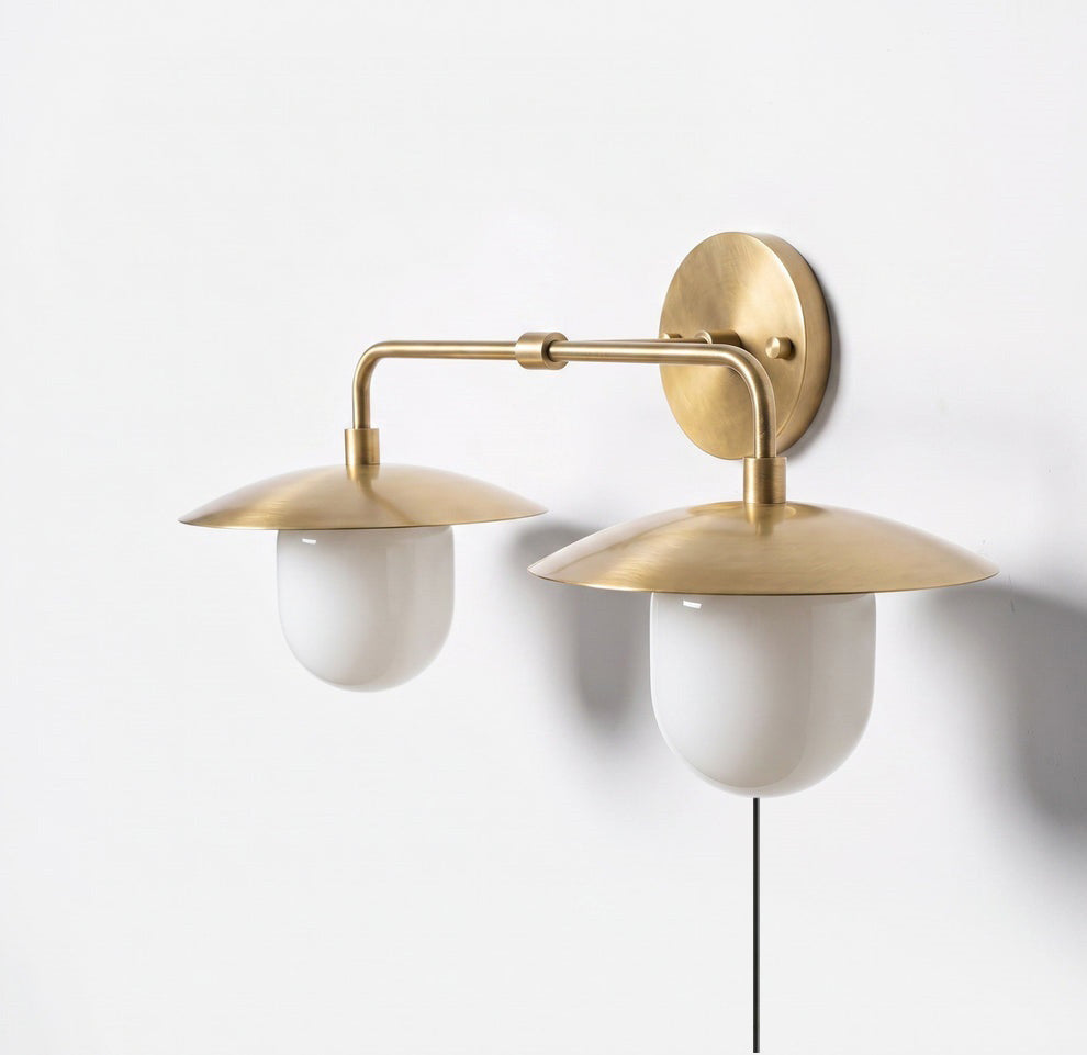 The Marie sconce shown with a compatible dimmer switch.