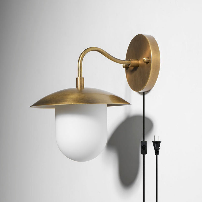 Front view of the single-head Marie Petite Plug-in Wall Sconce.