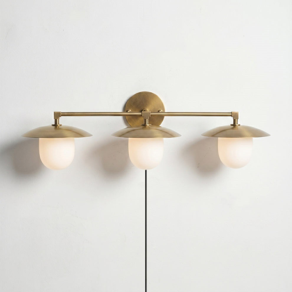 Side profile of the 3-head Marie sconce.
