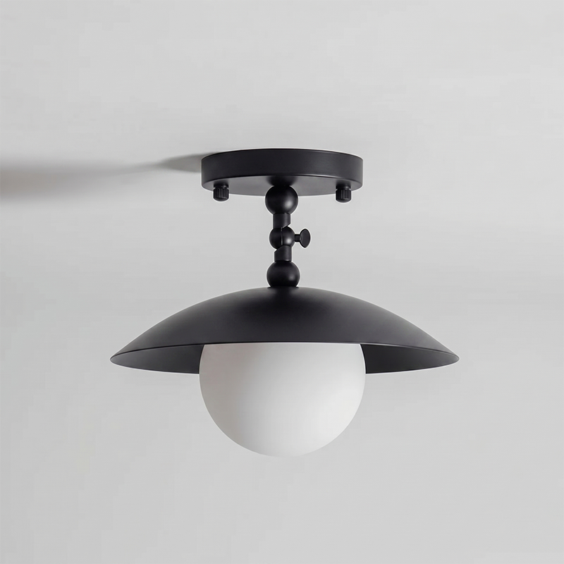 The smooth, clean lines of the opal glass shade.