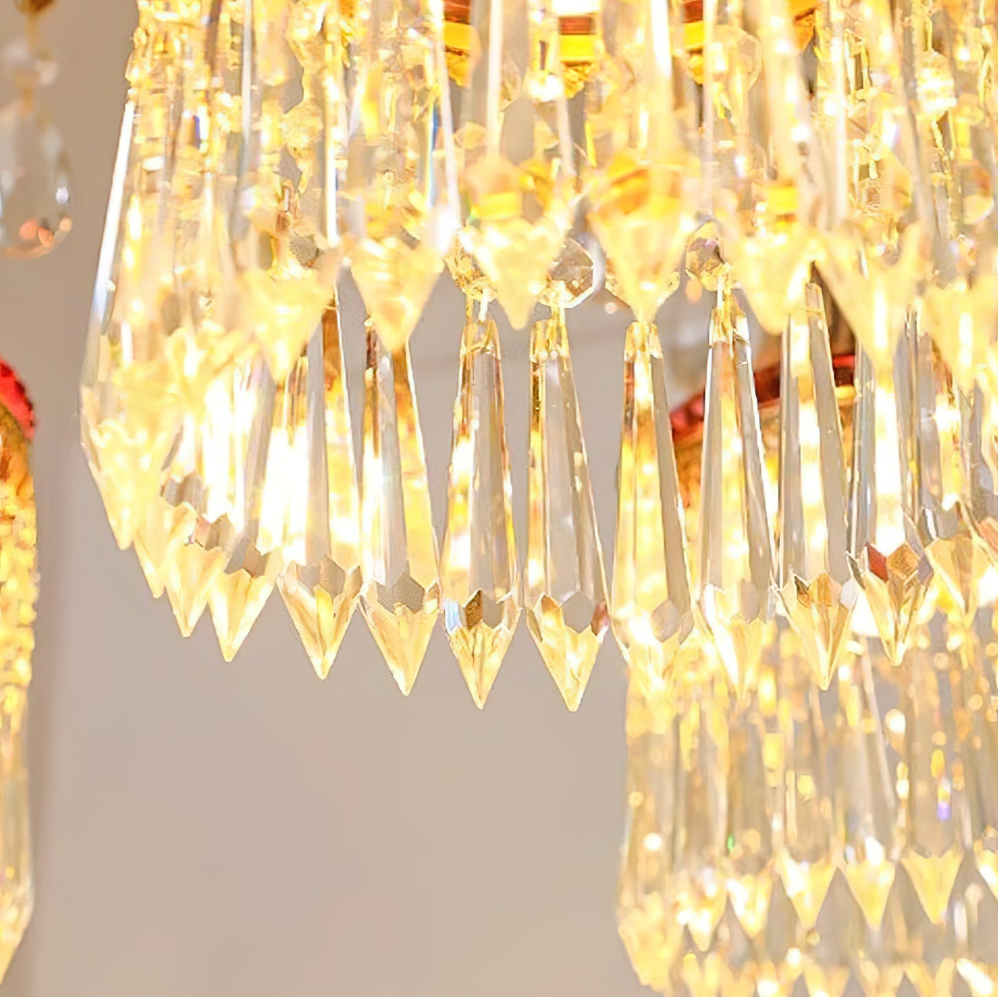 The chandelier with purple crystals, unlit, showing the rich color detail.