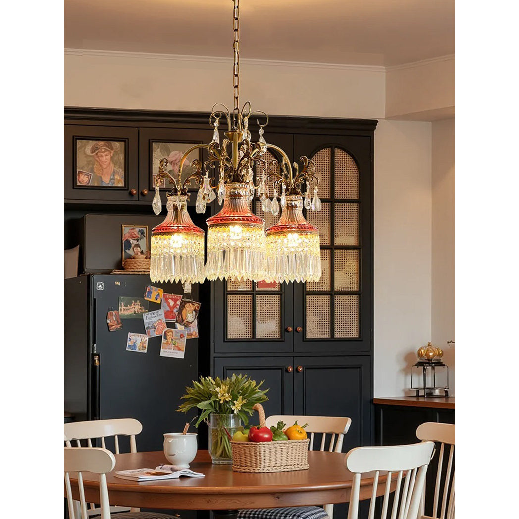 The chandelier shown with elegant purple crystal accents.