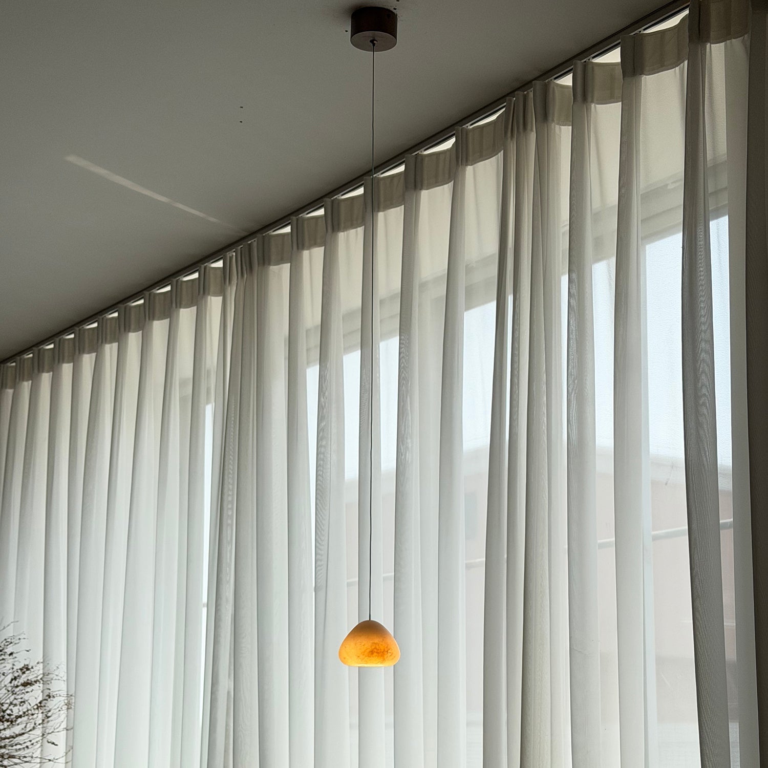 A creative installation of multiple Morphe pendants.