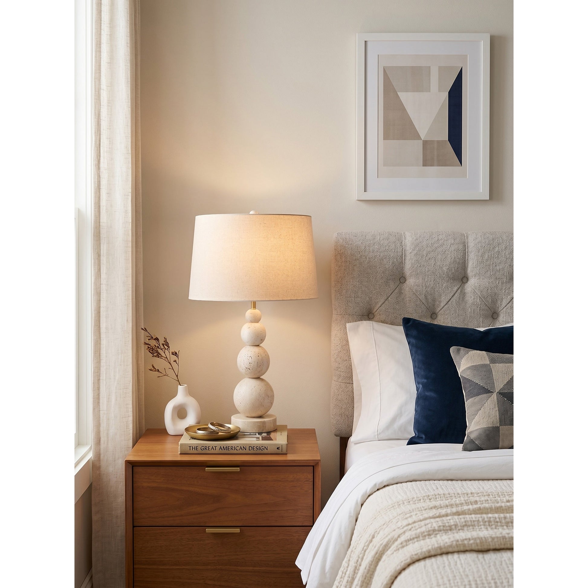 Niobe Table Lamp displayed on an entryway console table.